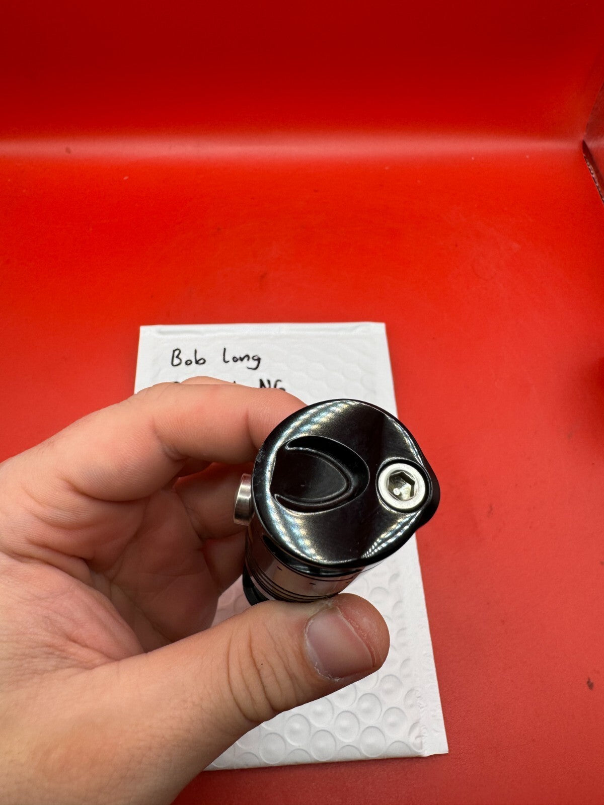 Bob Long Insight NG Bolt/Engine - used paintball bolt/engine assembly - black/red