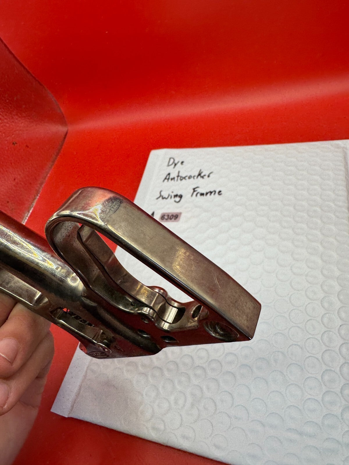 Dye Autococker Swing Frame