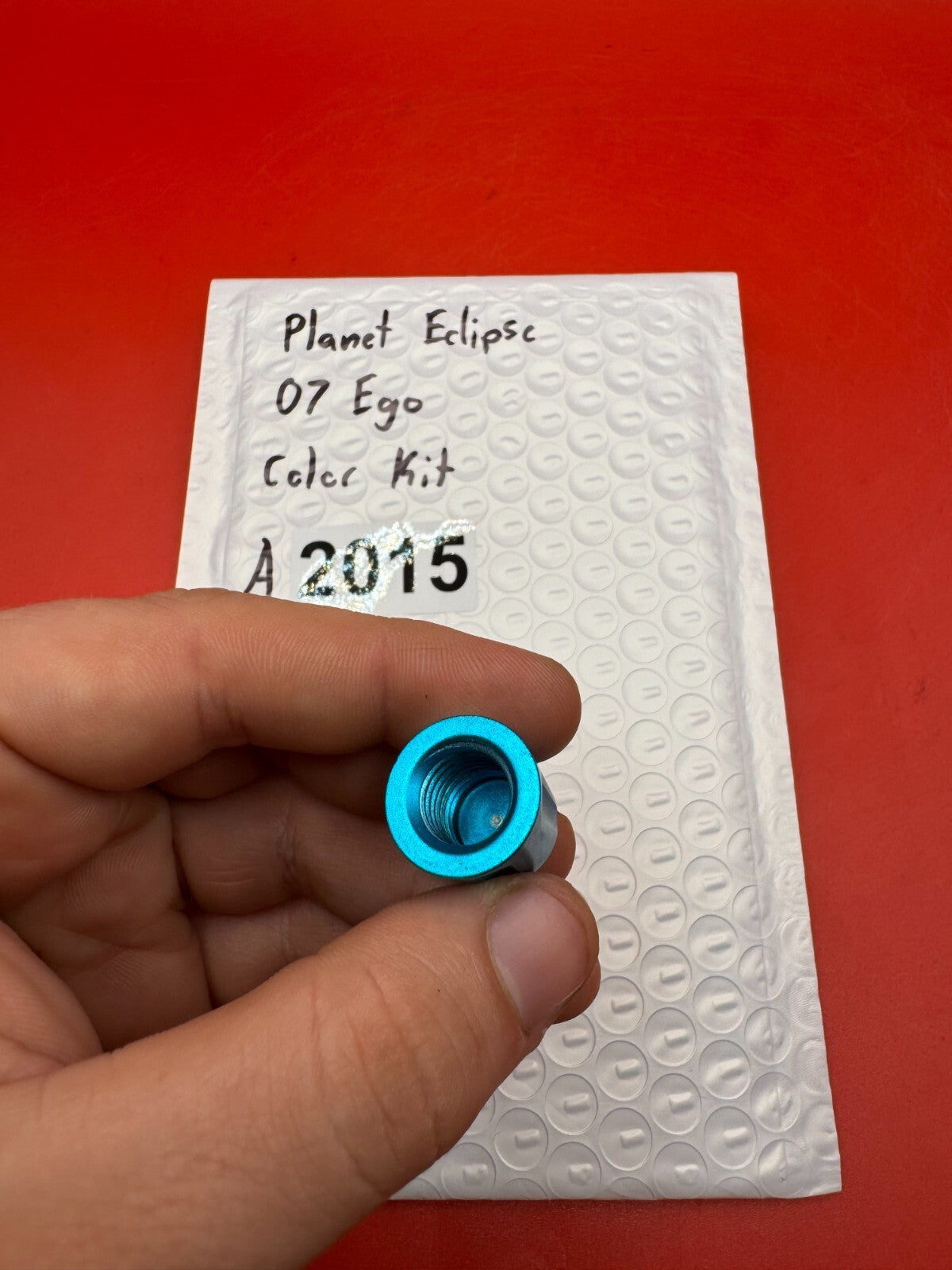 Planet Eclipse 07 Ego Color Kit - used paintball color kit (trigger, lpr cap, asa thumb screw) - teal anno