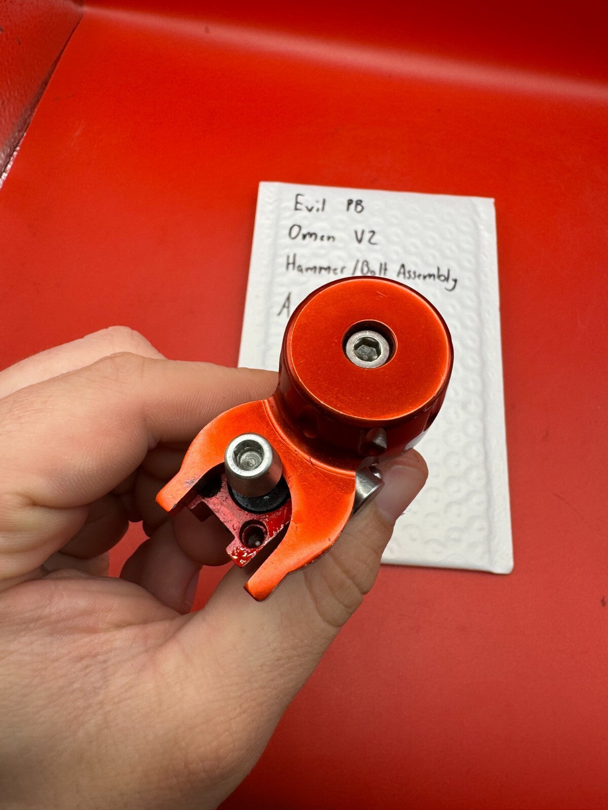 Evil PB Omen V2 Hammer/Bolt Assembly - used paintball hammer/bolt assembly - red anno/silver/white