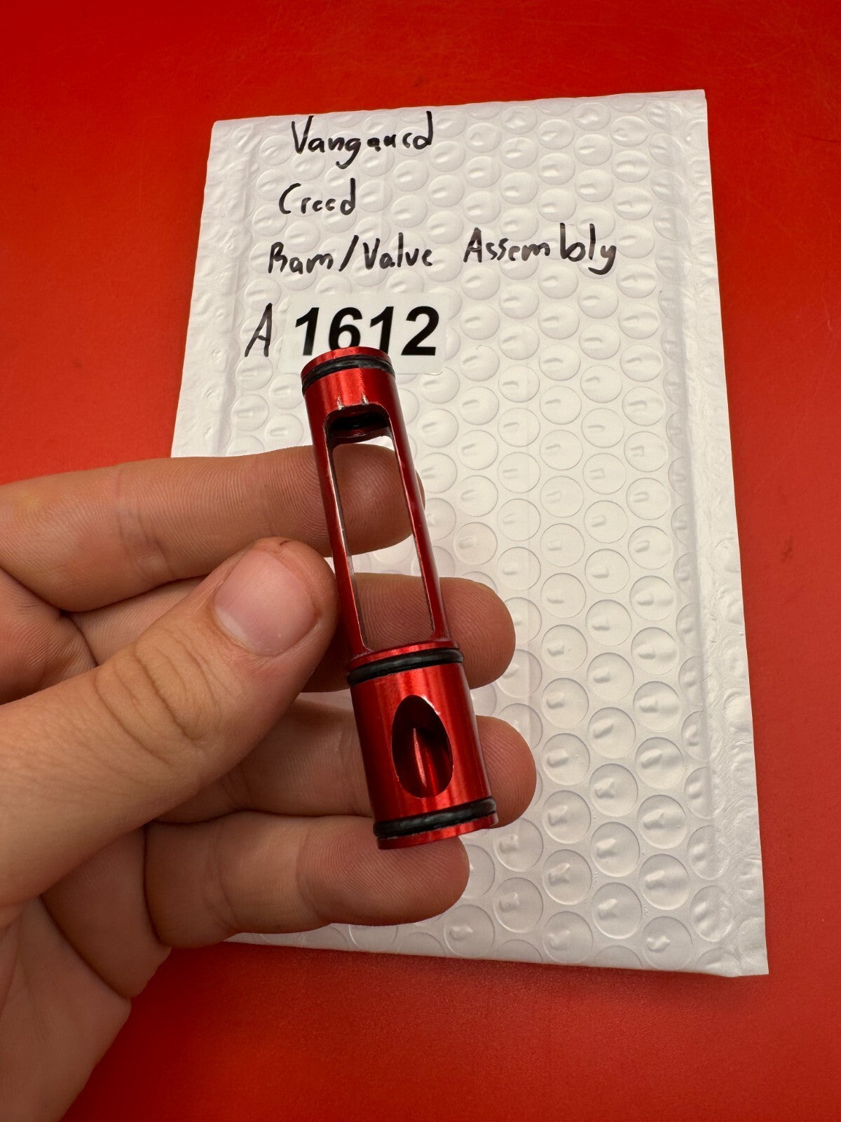 Vangaurd Creed Ram/Valve Assembly - used paintball ram/valve assembly - red anno/silver