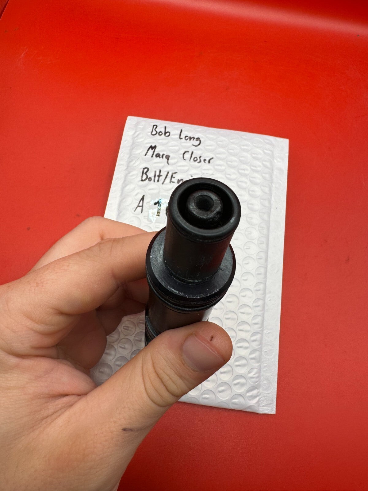 Bob Long Marq Closer Bolt/Engine - used paintball bolt/engine assembly - black