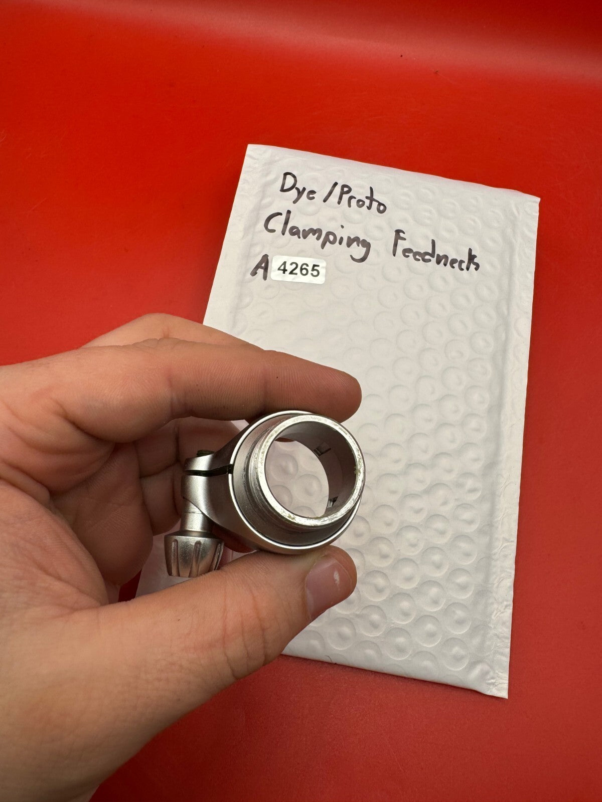 Dye/Proto Clamping Feedneck