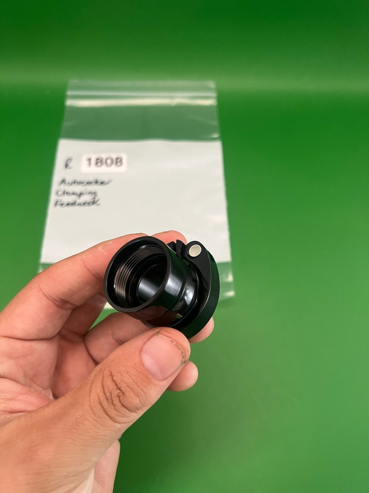 Autococker Clamping Feedneck