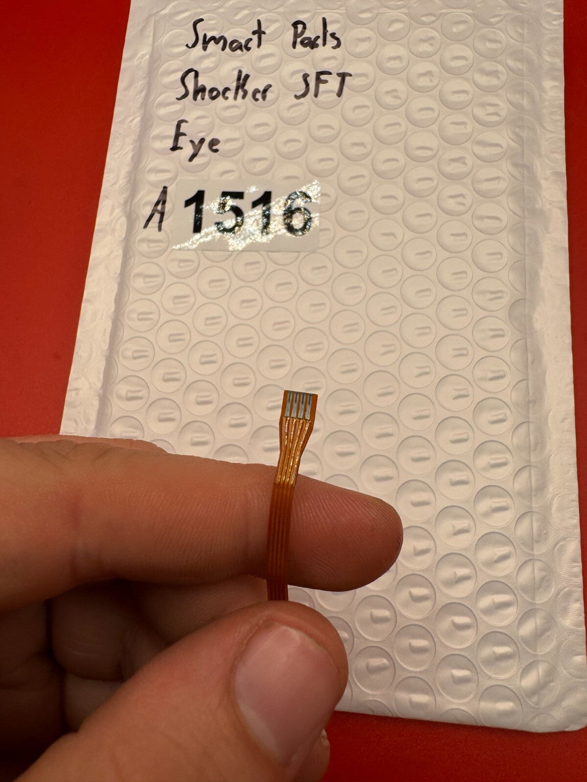 Smart Parts Shocker SFT Eye - used paintball eye (ball detent sensor / flex cable assembly) - copper/amber