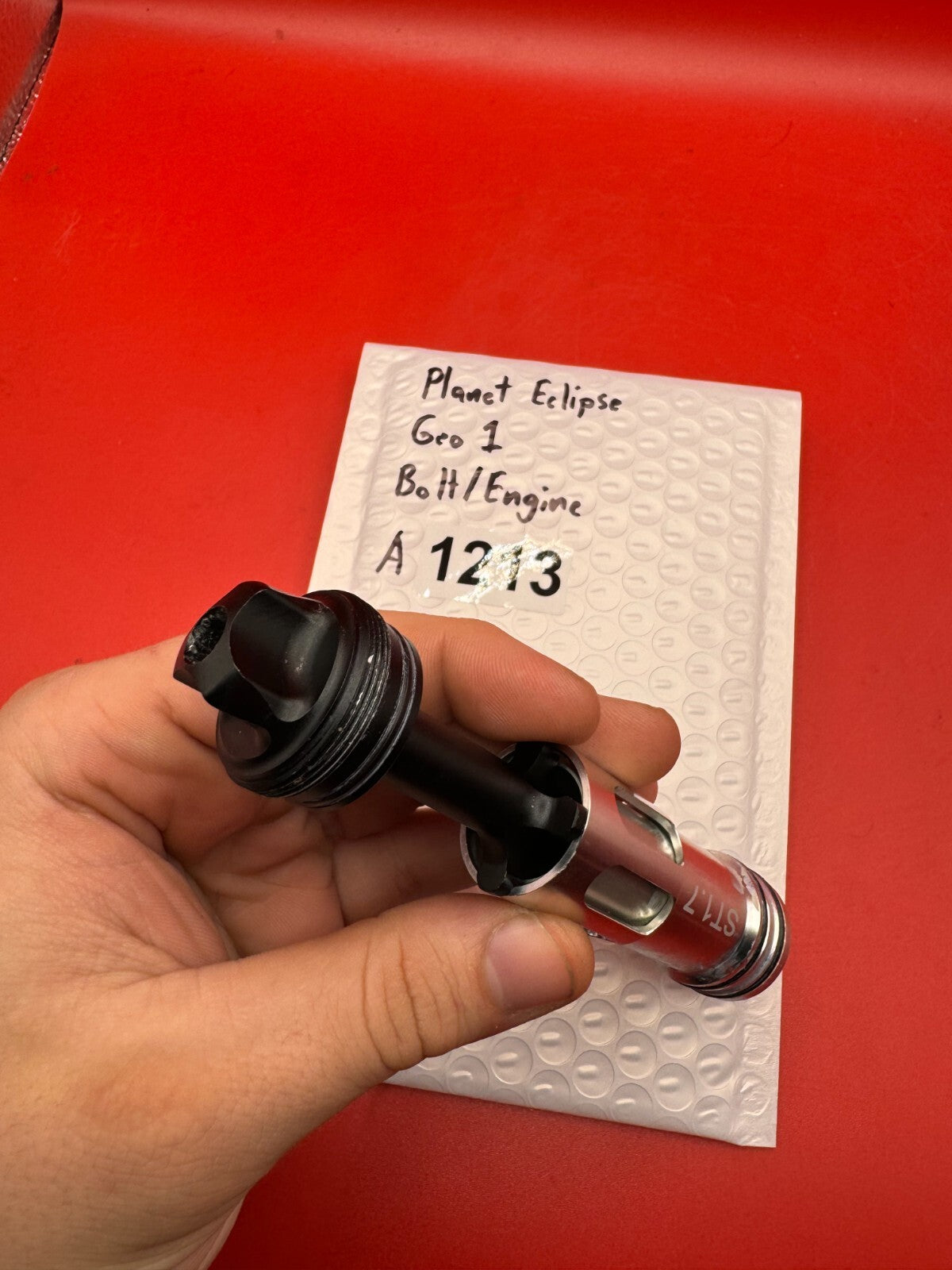 Planet Eclipse Geo 1 Bolt/Engine - used paintball bolt/engine assembly - silver/black/red