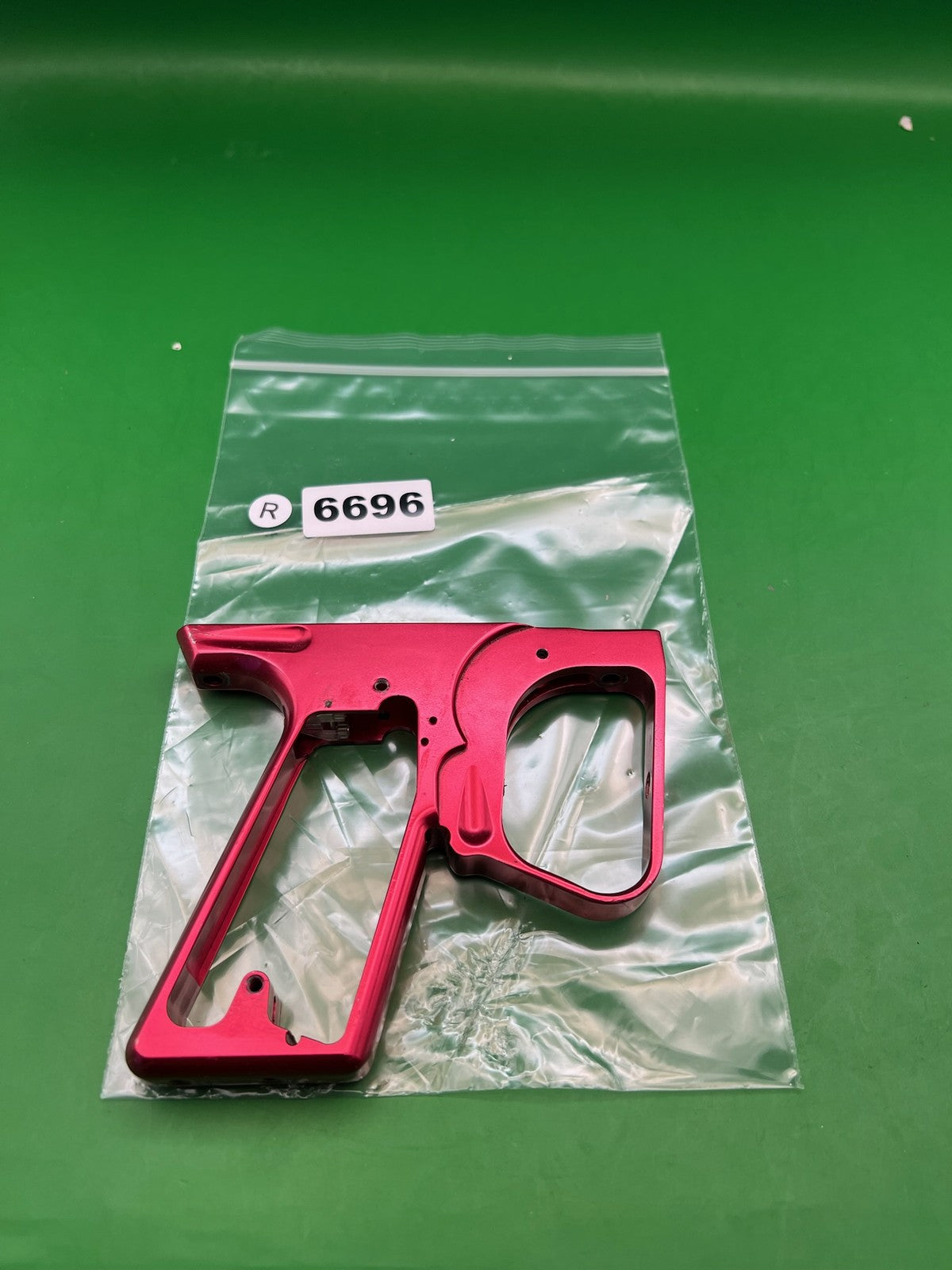 Red Smart Parts Shocker SFT Frame - used paintball trigger frame - red anno