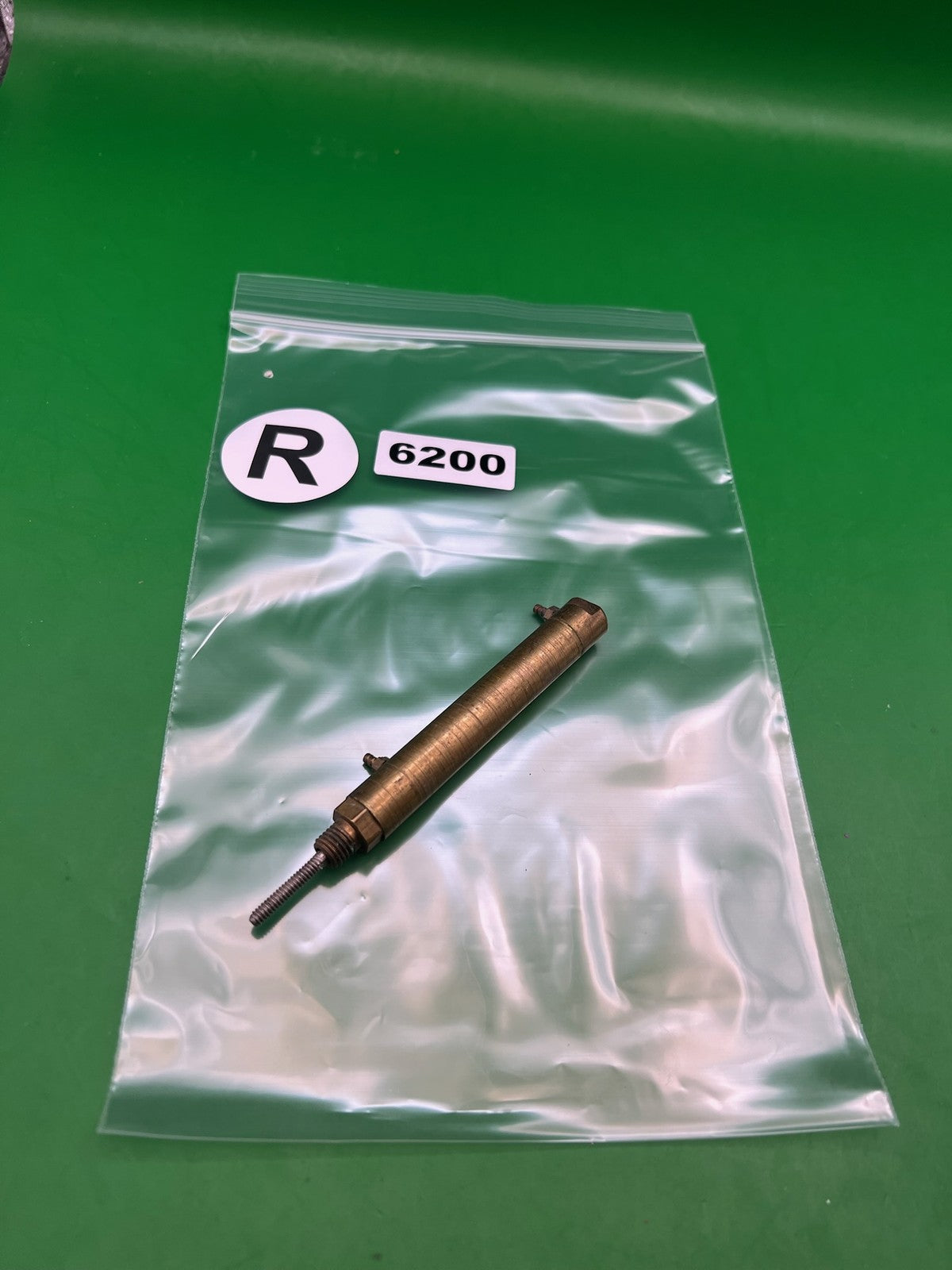 Brass Autococker Ram - used paintball ram - brass