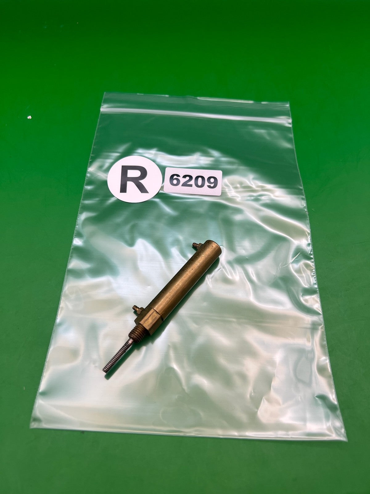 Brass Autococker Ram - used paintball ram - brass