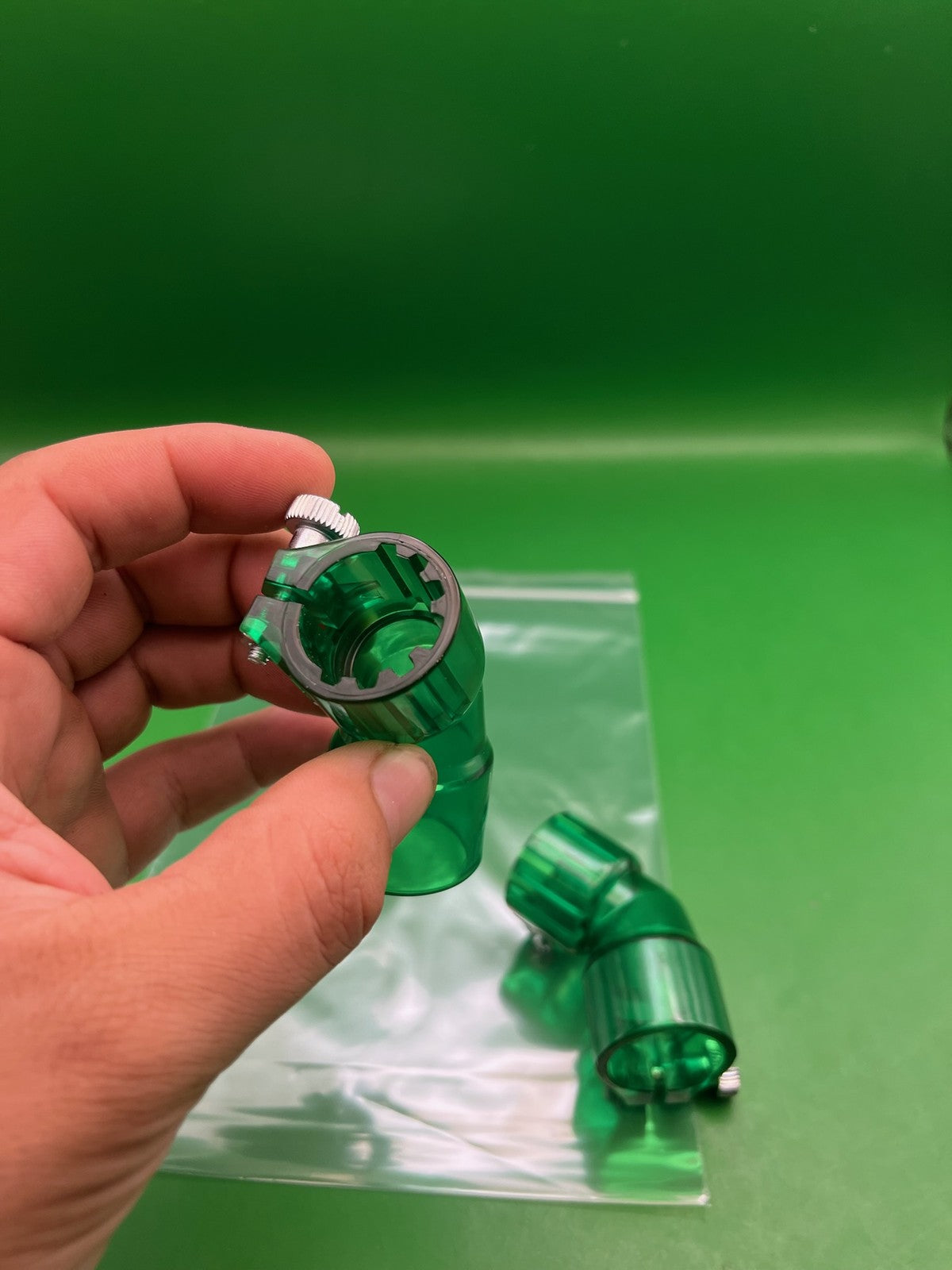 Pair of 2 Green Paintball Right Feed Elbows - used paintball feed elbow - transparent green