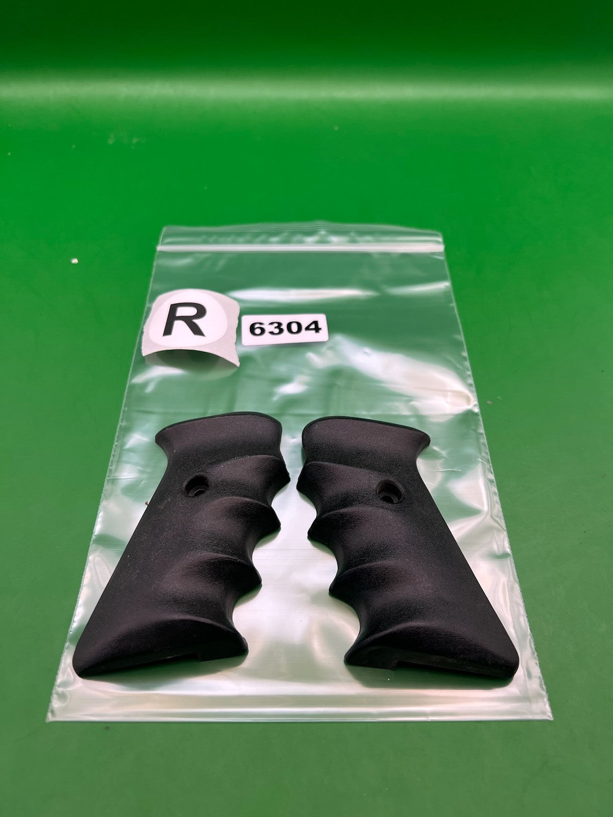 Single Hole Automag Grips - used paintball grip panels - black