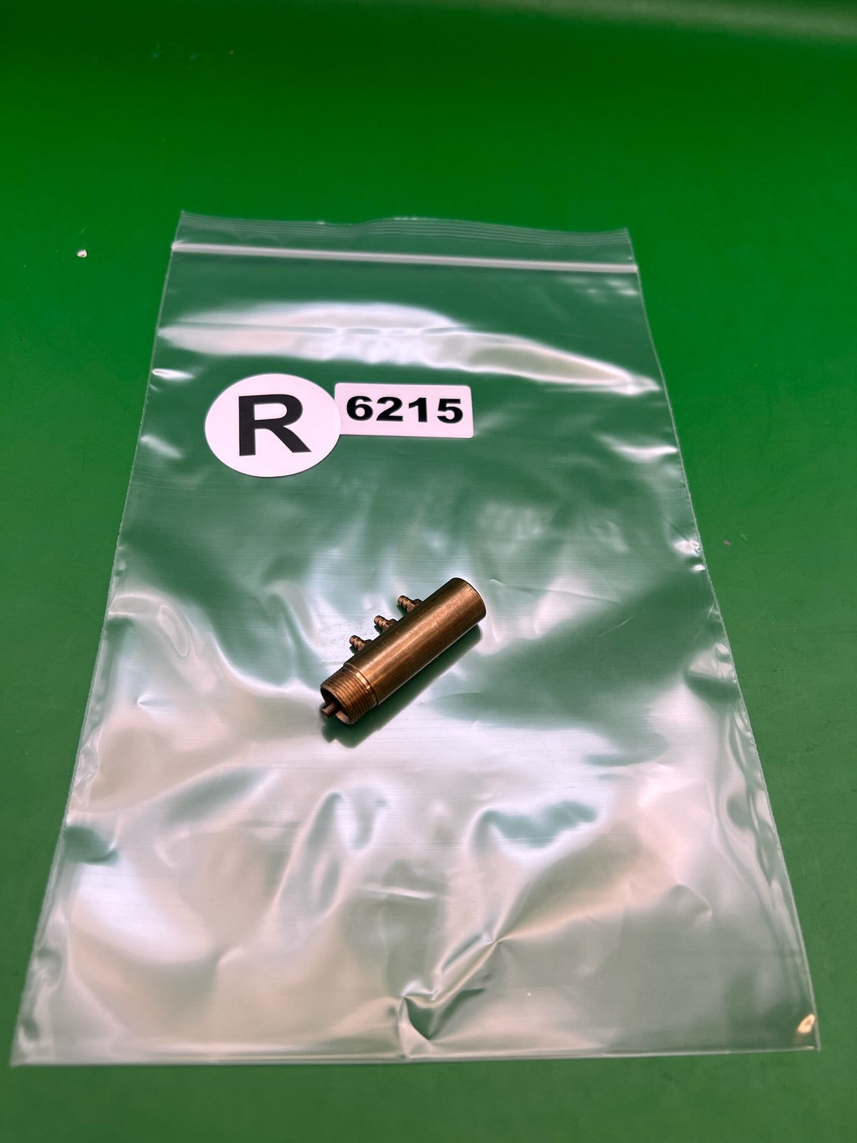 Brass Autococker Ram - used paintball ram - brass