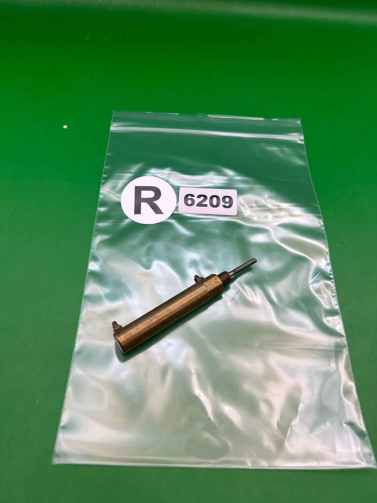 Brass Autococker Ram - used paintball ram - brass