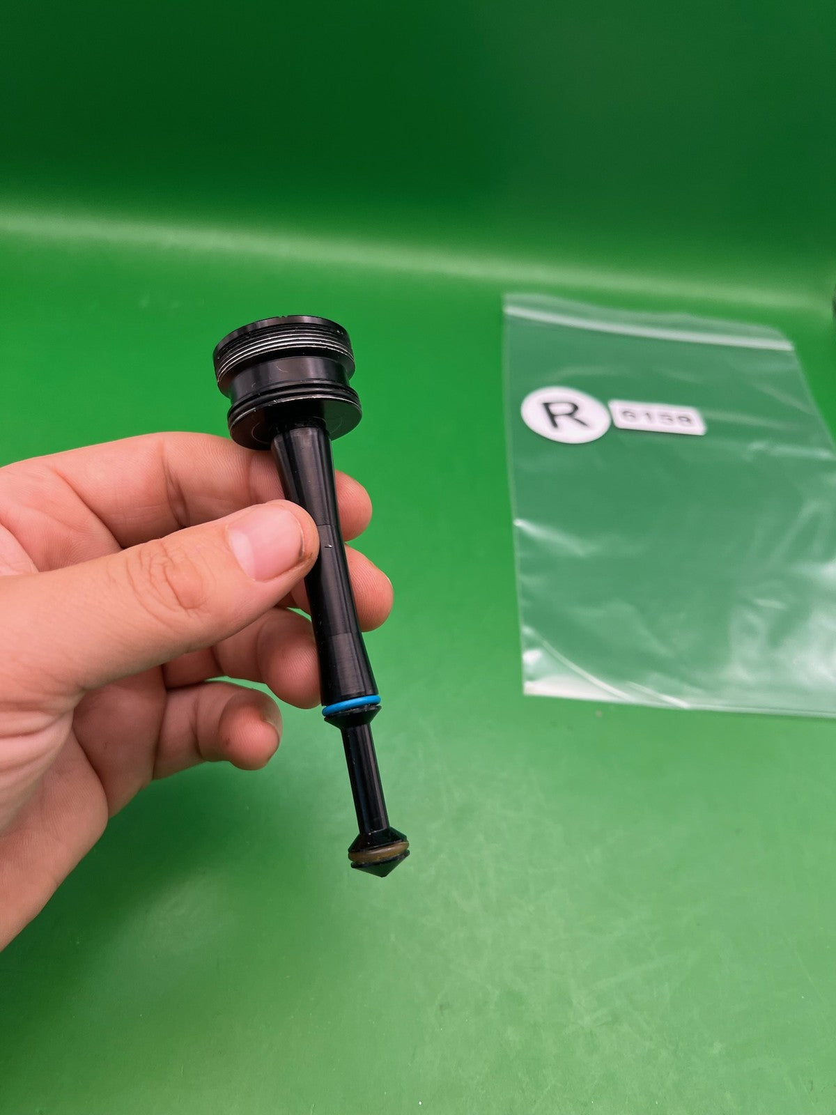 Stock NXT Bolt Guide - used paintball bolt guide - black