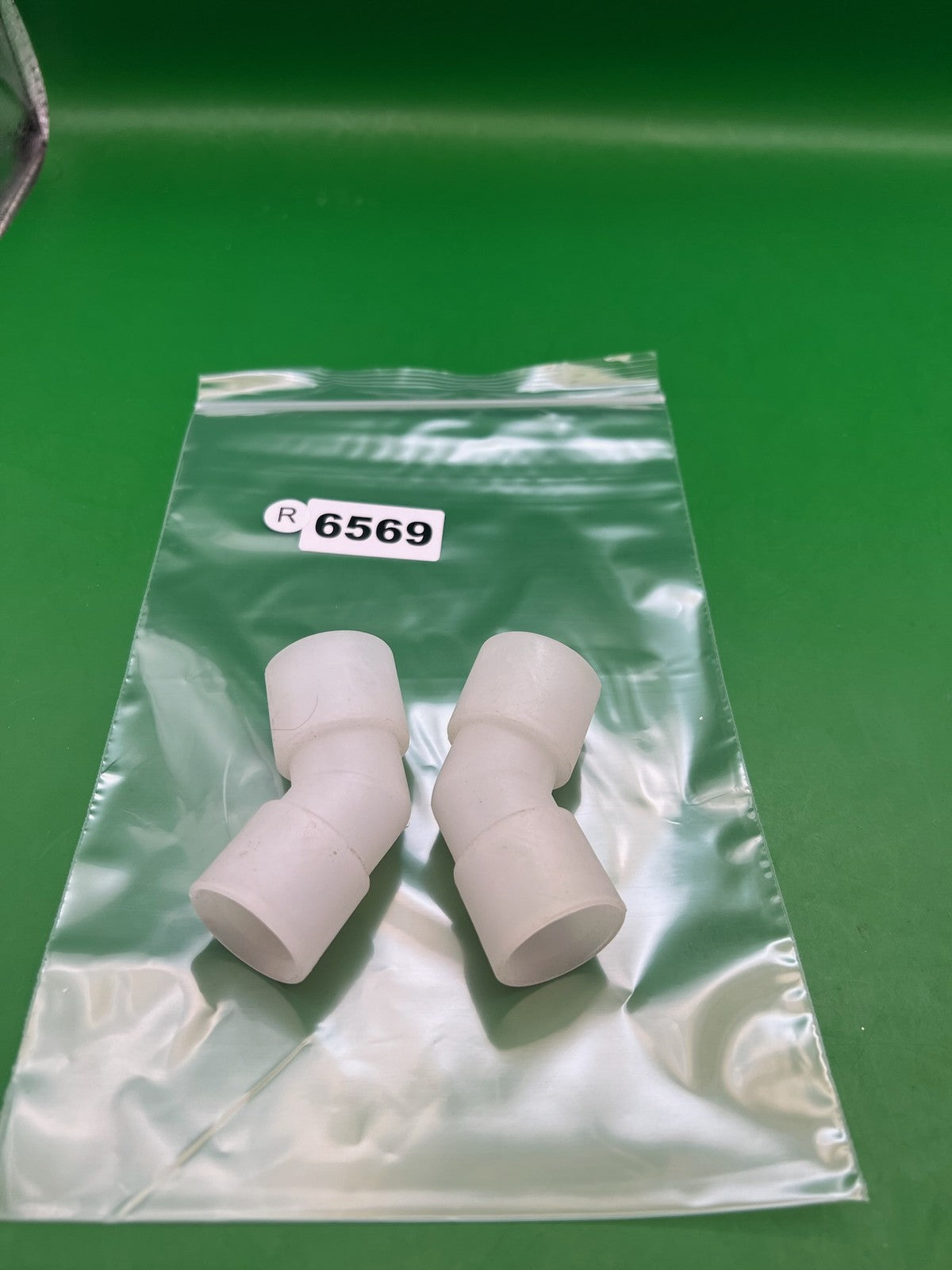 Pair of Two White Paintball Right Feed Elbows - used paintball feed elbow - white