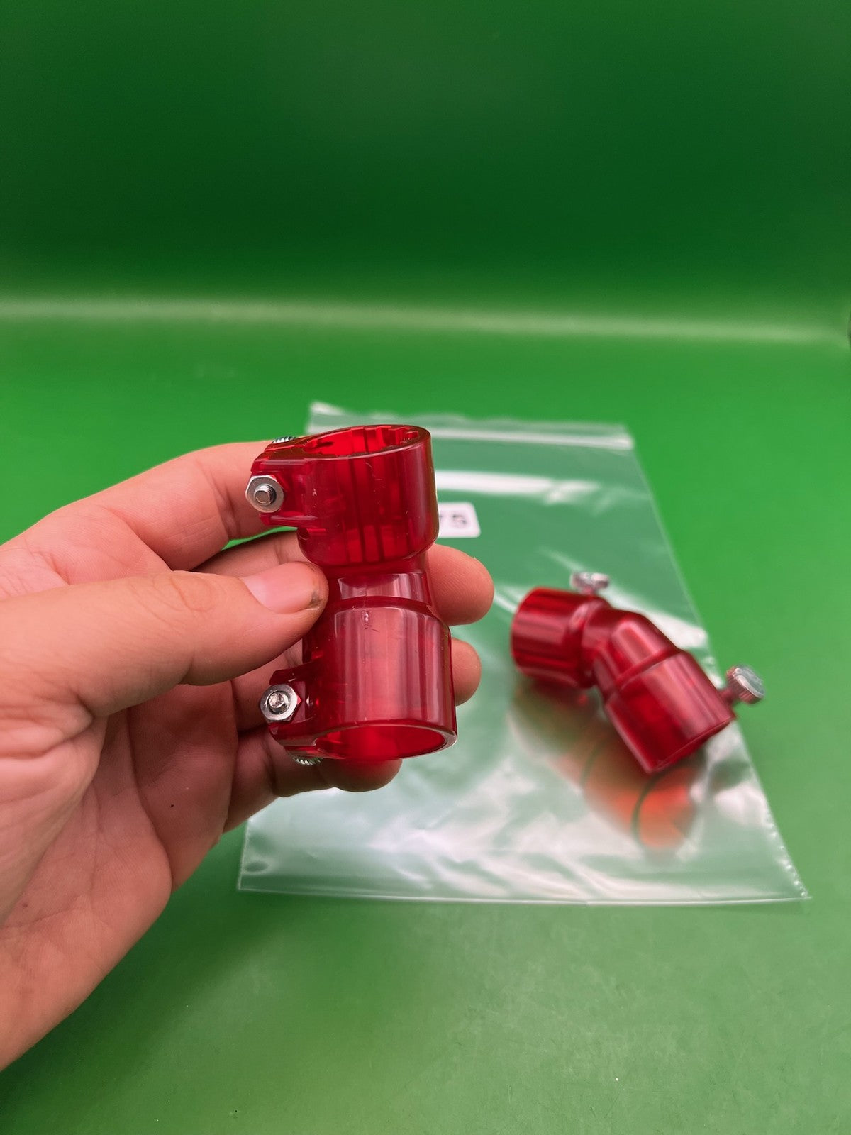 Pair of Two Red Paintball Right Feed Elbows - used paintball feed elbow - red