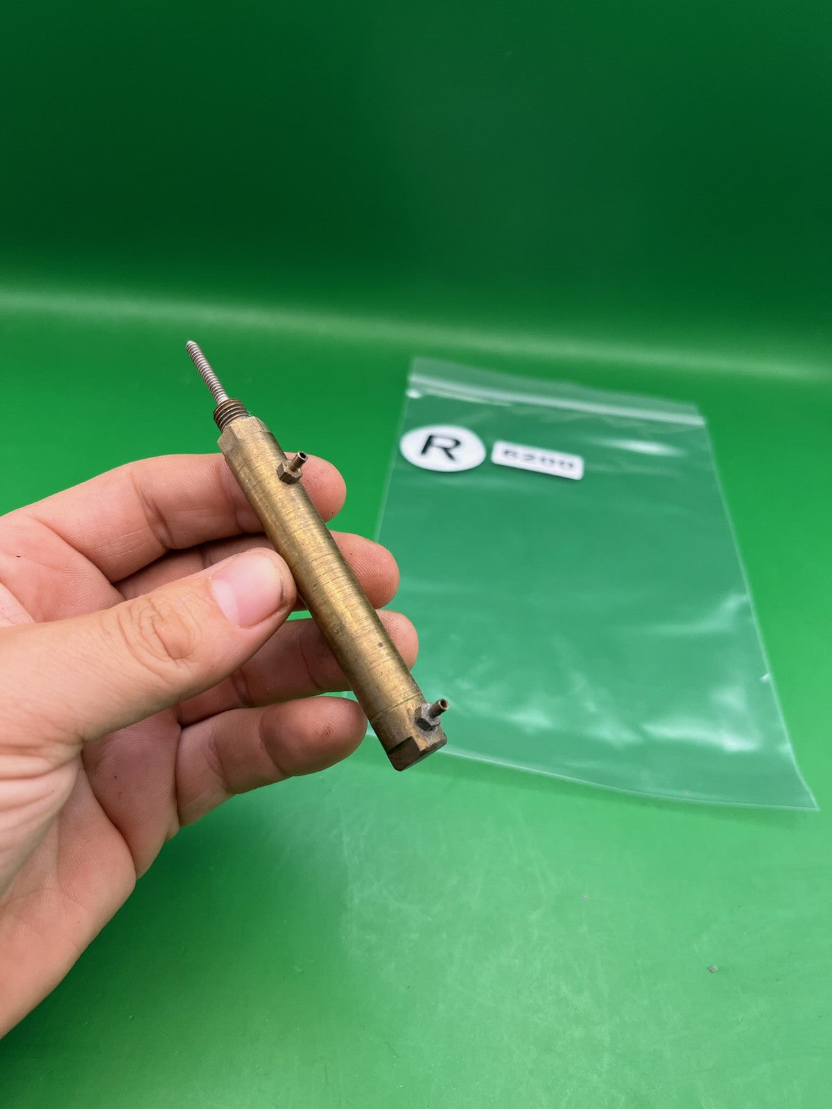 Brass Autococker Ram - used paintball ram - brass