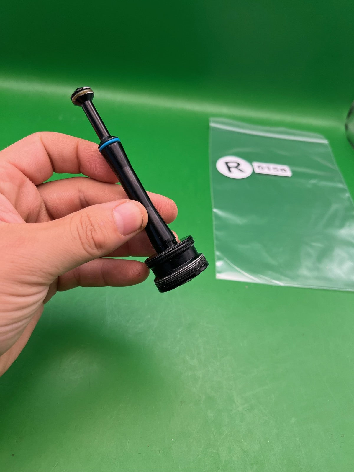 Stock NXT Bolt Guide - used paintball bolt guide - black