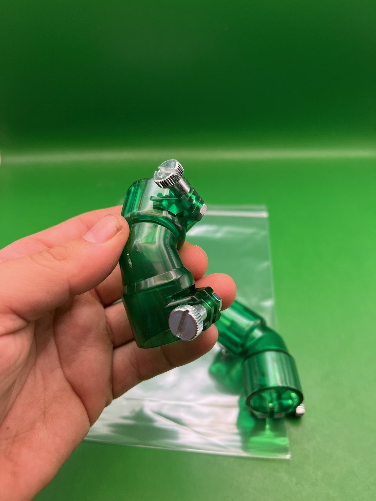 Pair of 2 Green Paintball Right Feed Elbows - used paintball feed elbow - transparent green