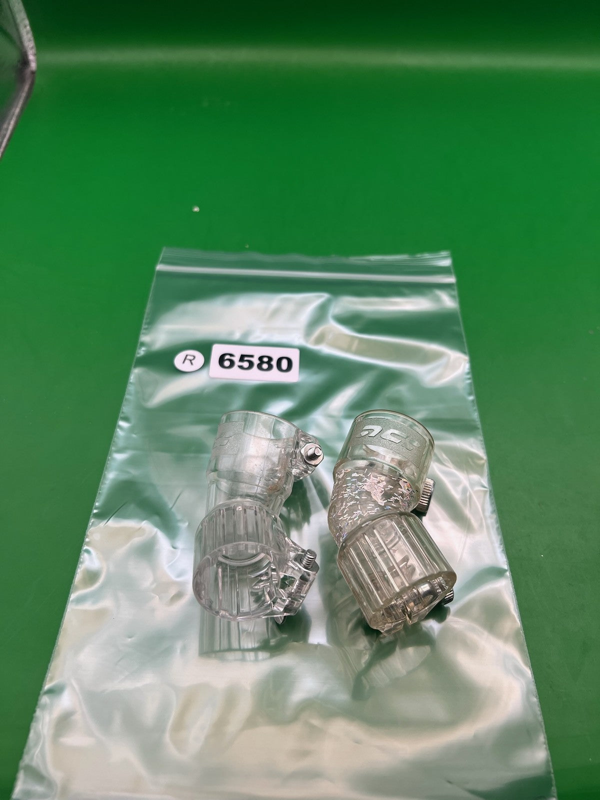 Pair of Two Clear Paintball Right Feed Elbows - used paintball feed elbow - clear