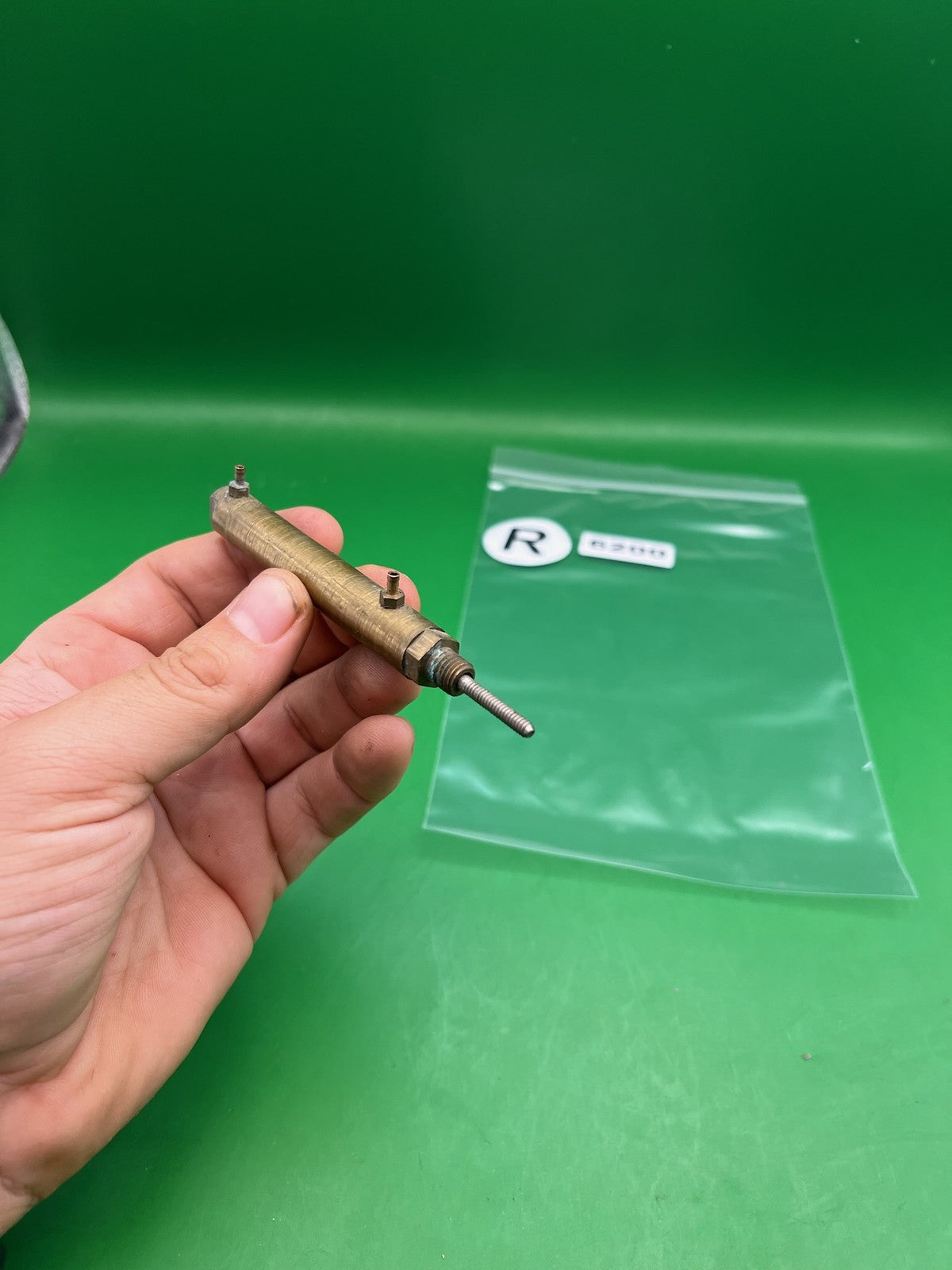Brass Autococker Ram - used paintball ram - brass