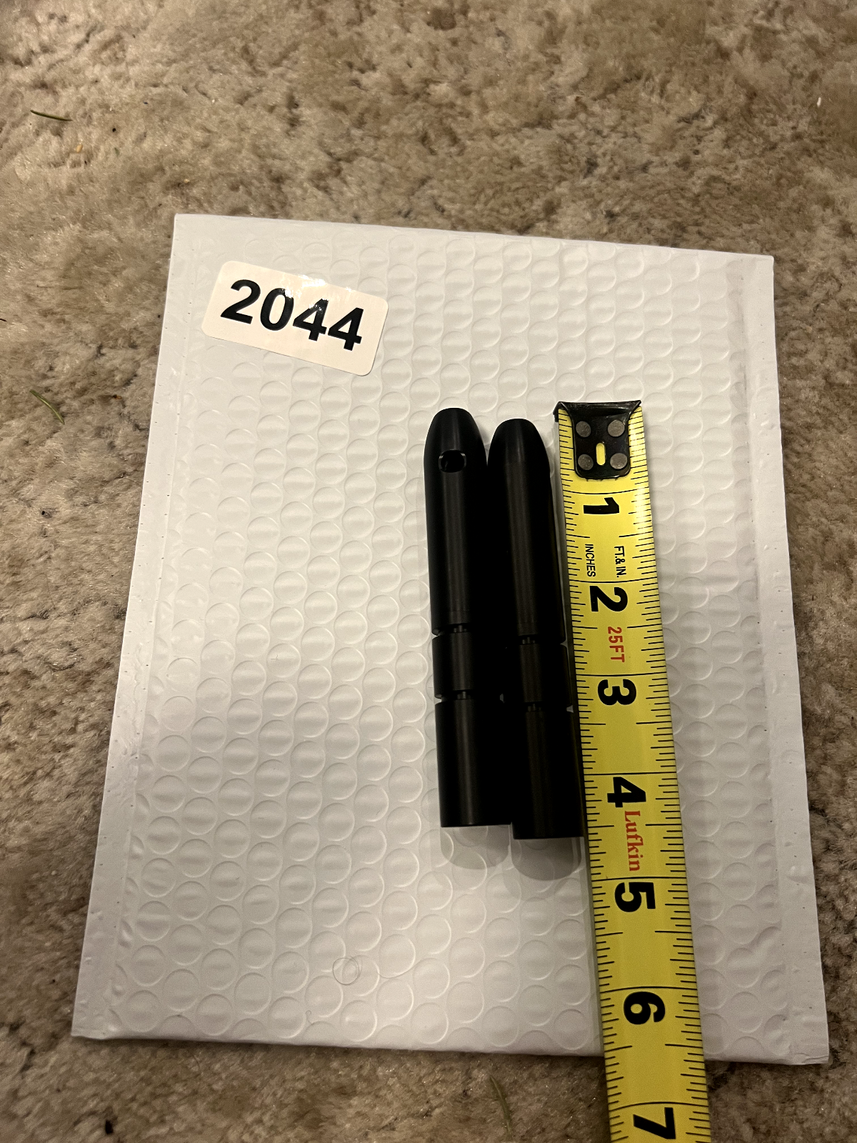 Two Unknown Paintball bolts