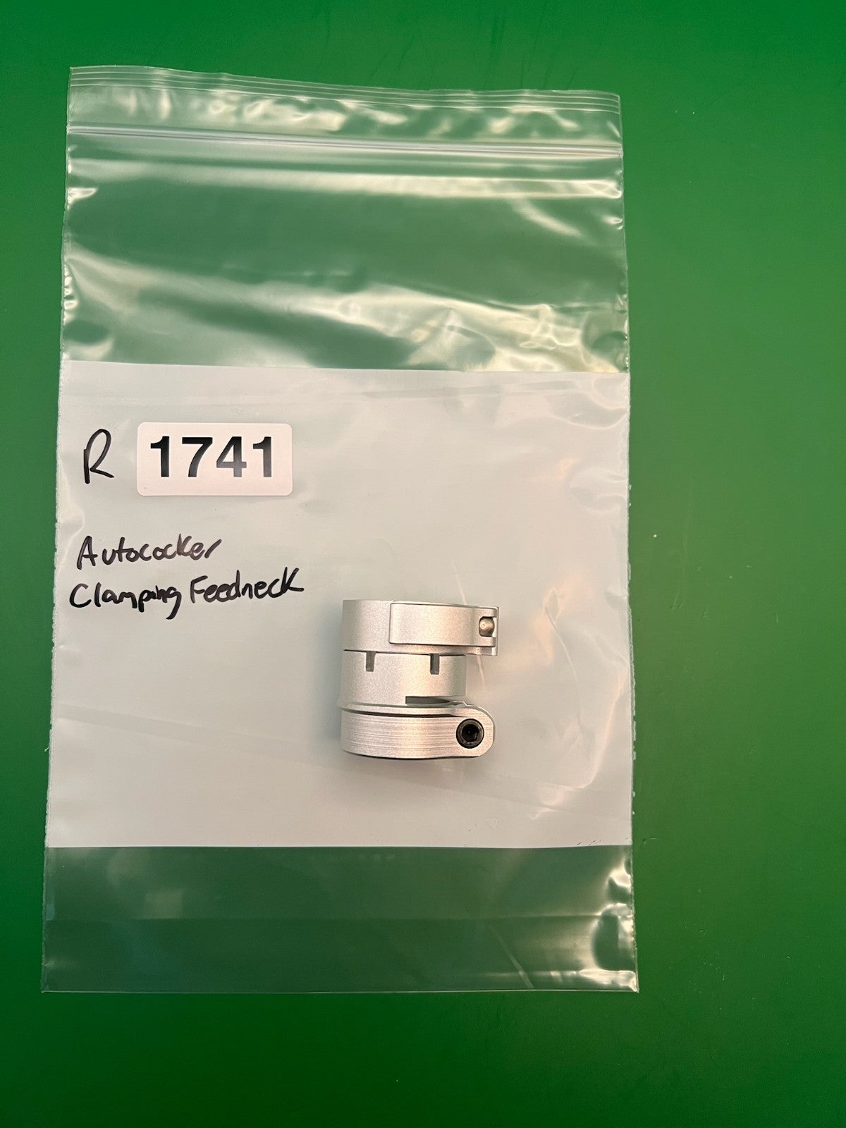 Autococker Clamping Feedneck