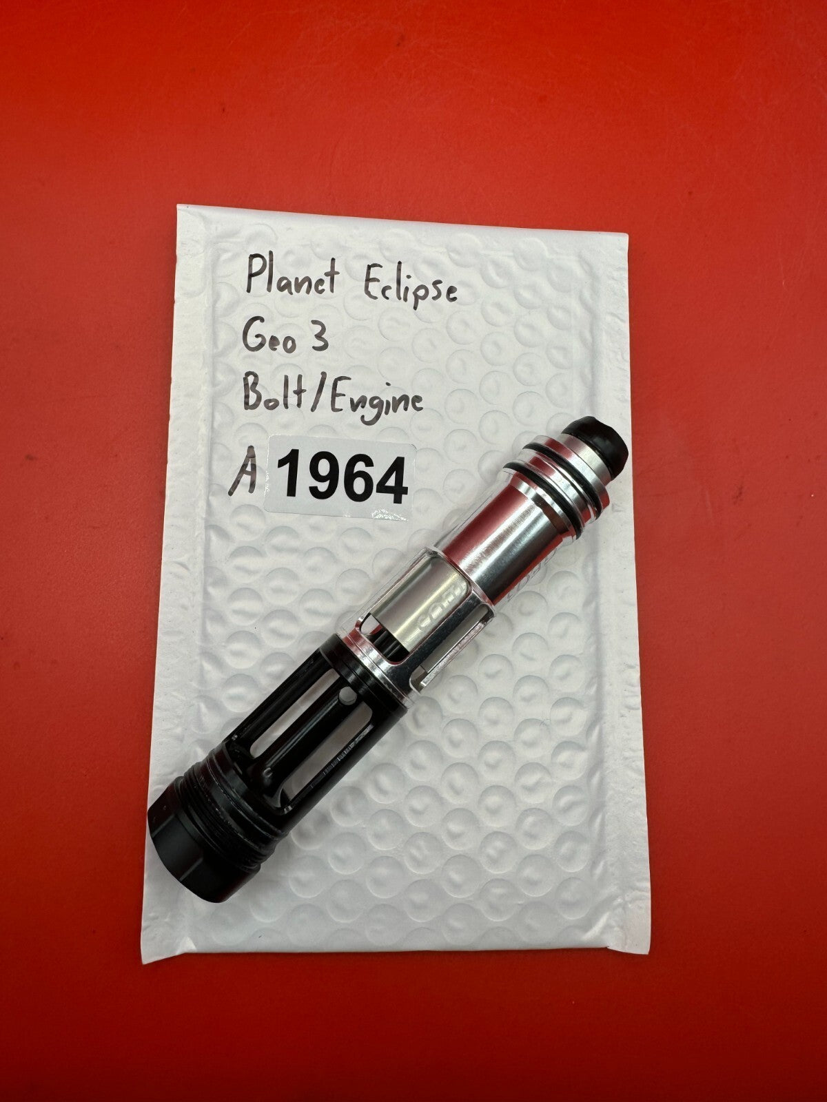 Planet Eclipse Geo 3 Bolt/Engine - used paintball bolt/engine assembly - black/silver
