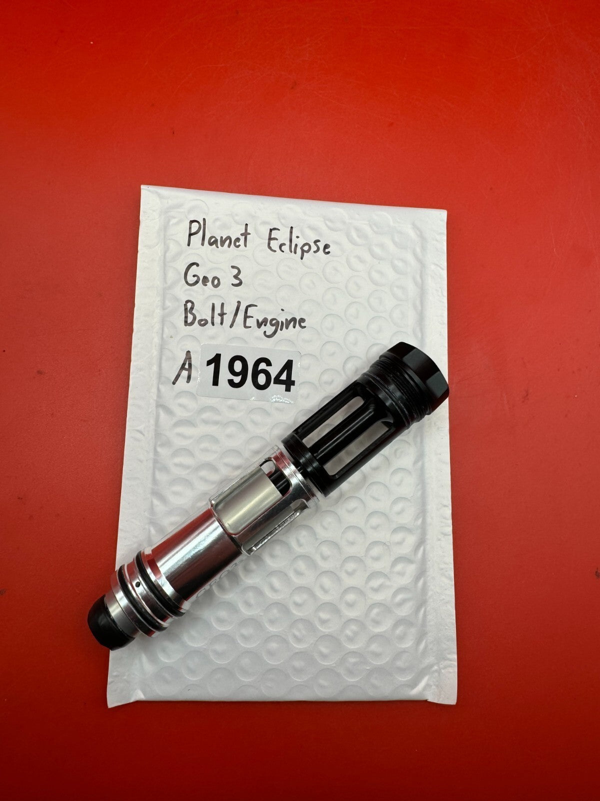 Planet Eclipse Geo 3 Bolt/Engine - used paintball bolt/engine assembly - black/silver