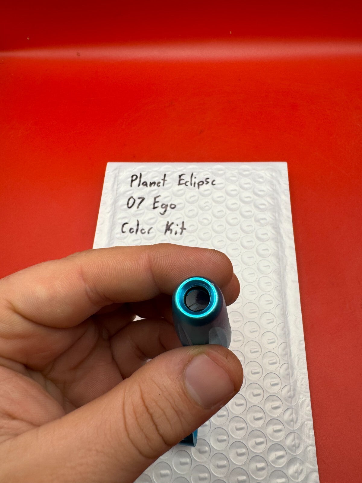 Planet Eclipse 07 Ego Color Kit - used paintball color kit (trigger, lpr cap, asa thumb screw) - teal anno