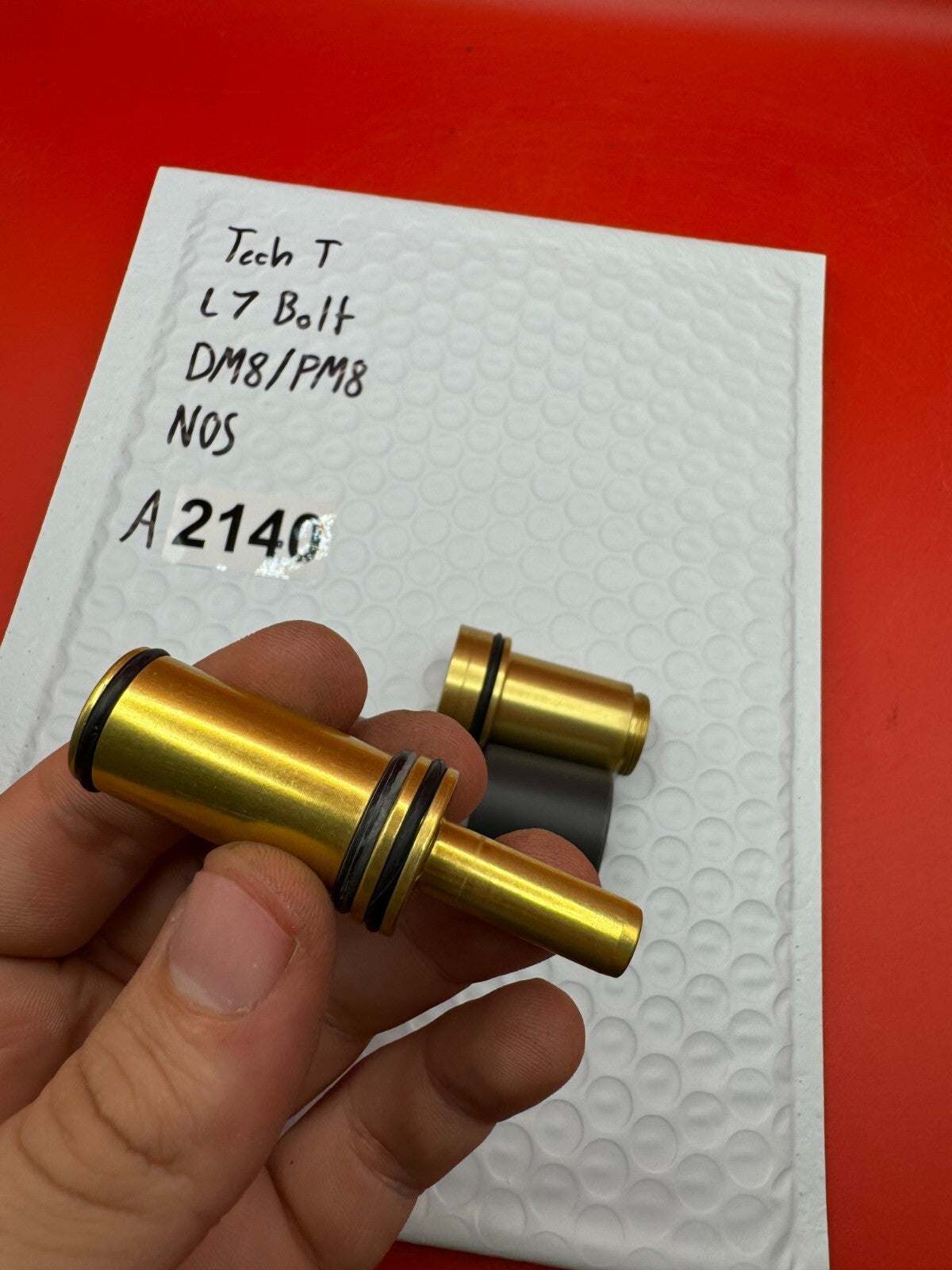 Tech T L7 Bolt DM8/PM8 NOS - used paintball bolt - gold/black