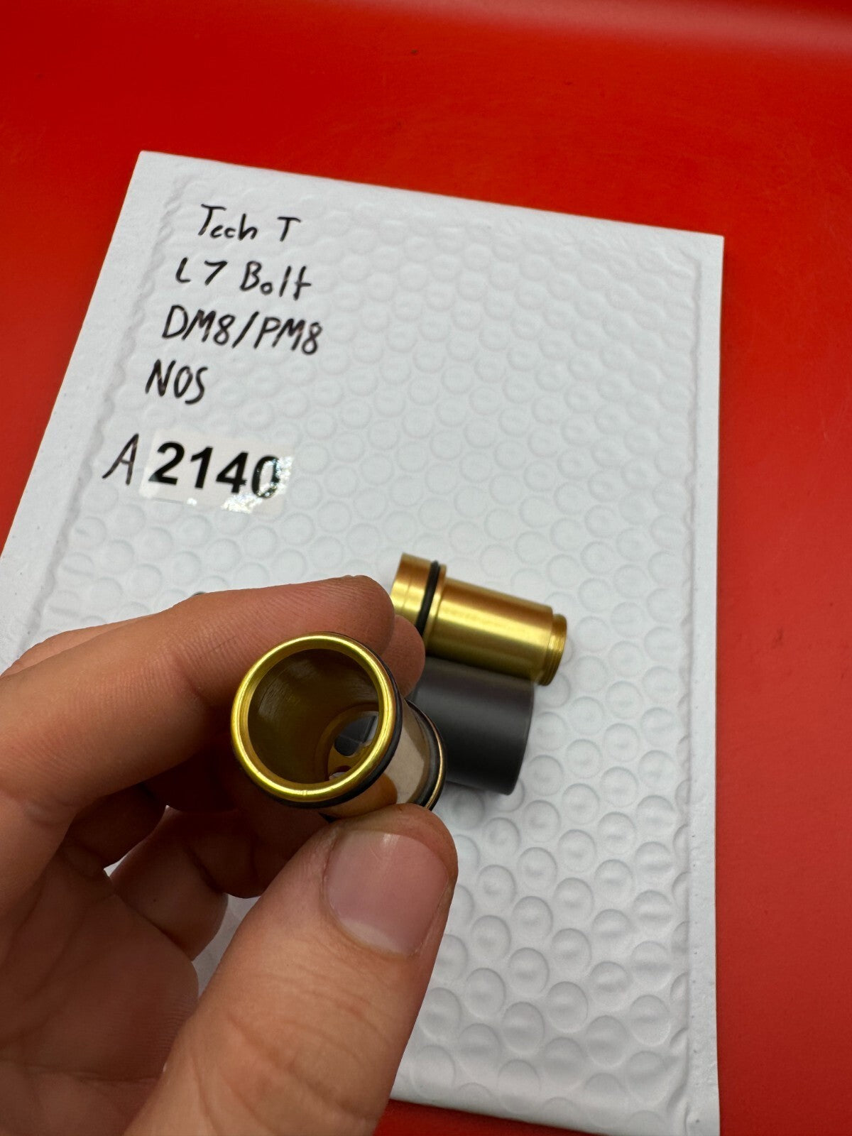Tech T L7 Bolt DM8/PM8 NOS - used paintball bolt - gold/black
