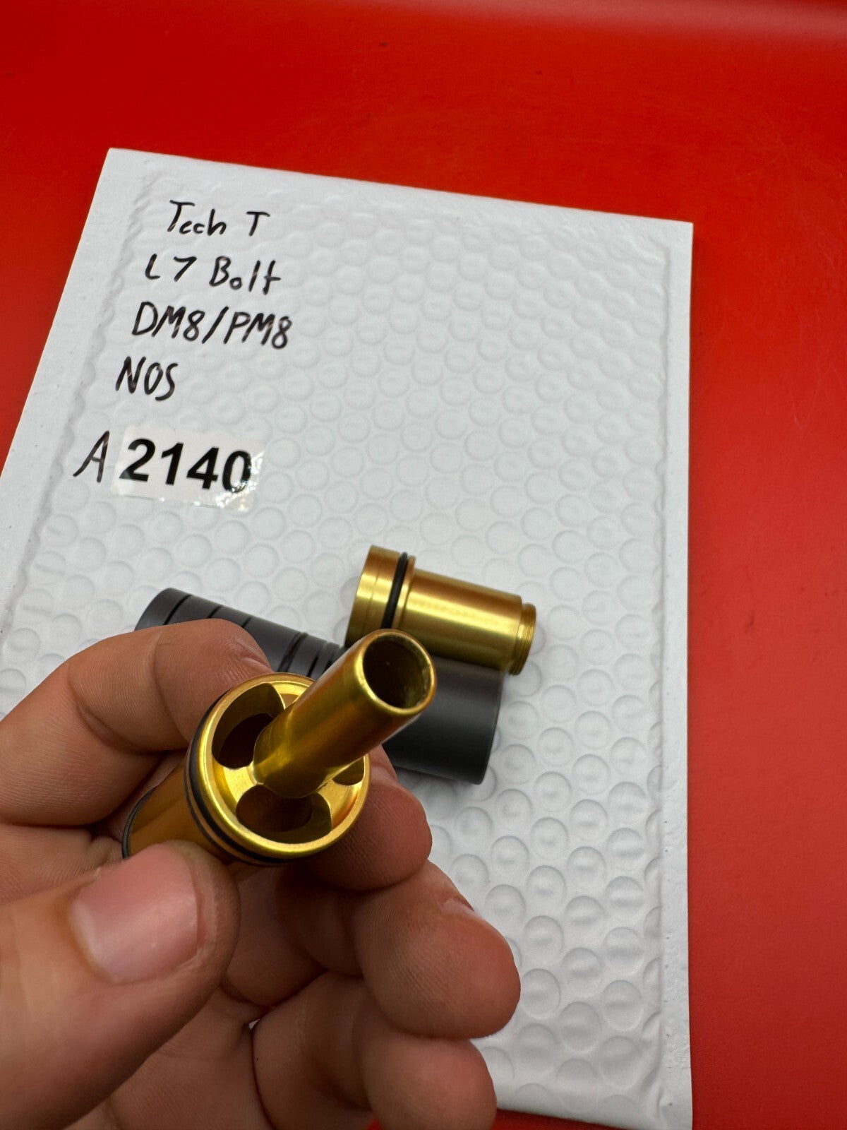 Tech T L7 Bolt DM8/PM8 NOS - used paintball bolt - gold/black
