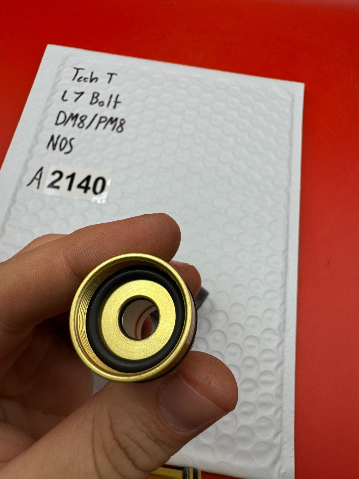 Tech T L7 Bolt DM8/PM8 NOS - used paintball bolt - gold/black