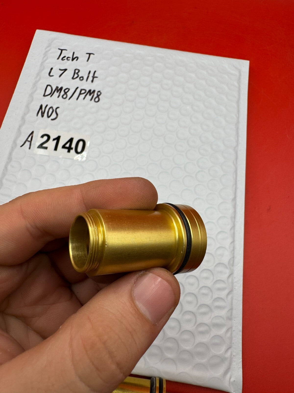 Tech T L7 Bolt DM8/PM8 NOS - used paintball bolt - gold/black