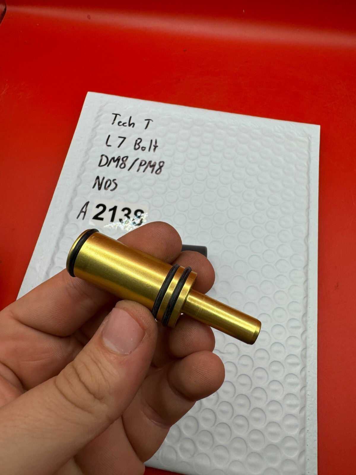 Tech T L7 Bolt DM8/PM8 NOS - used paintball bolt - gold/black