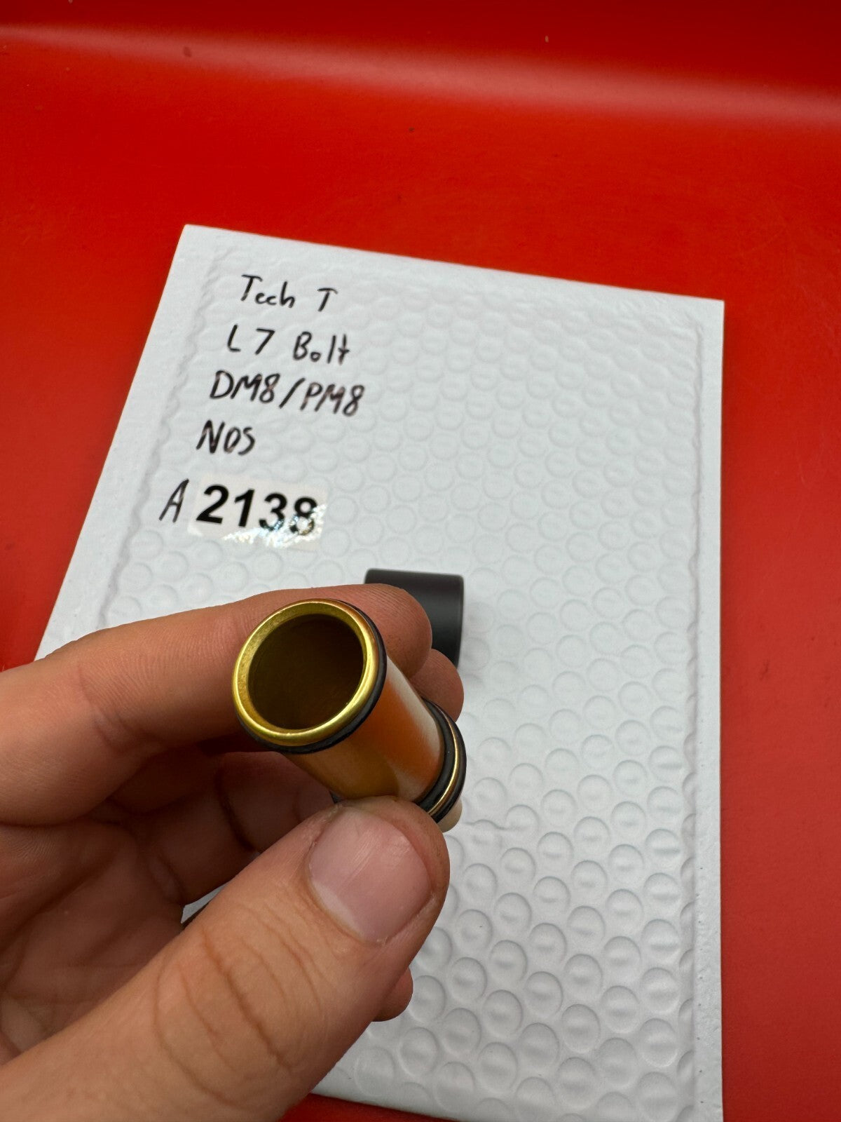 Tech T L7 Bolt DM8/PM8 NOS - used paintball bolt - gold/black