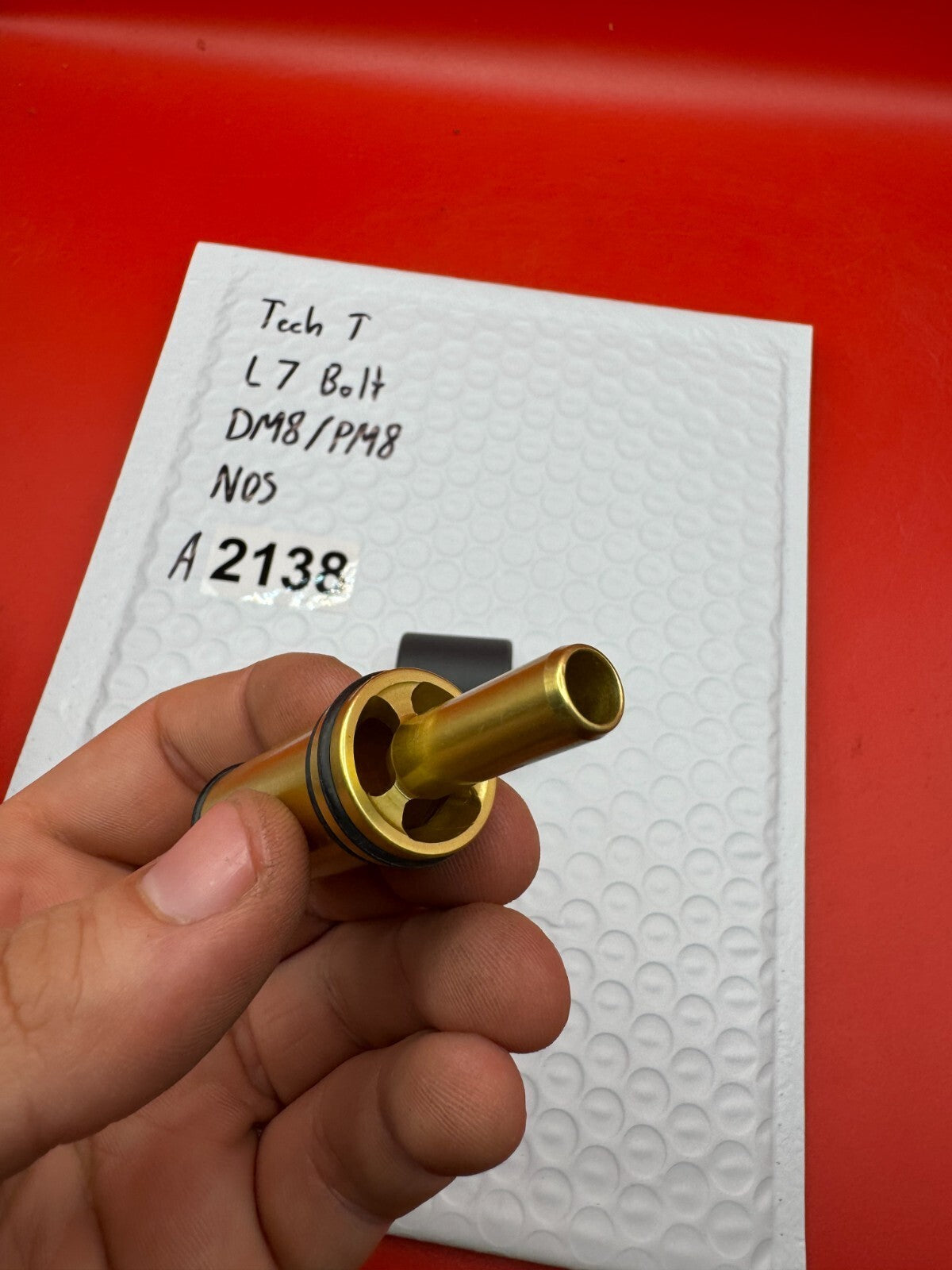 Tech T L7 Bolt DM8/PM8 NOS - used paintball bolt - gold/black
