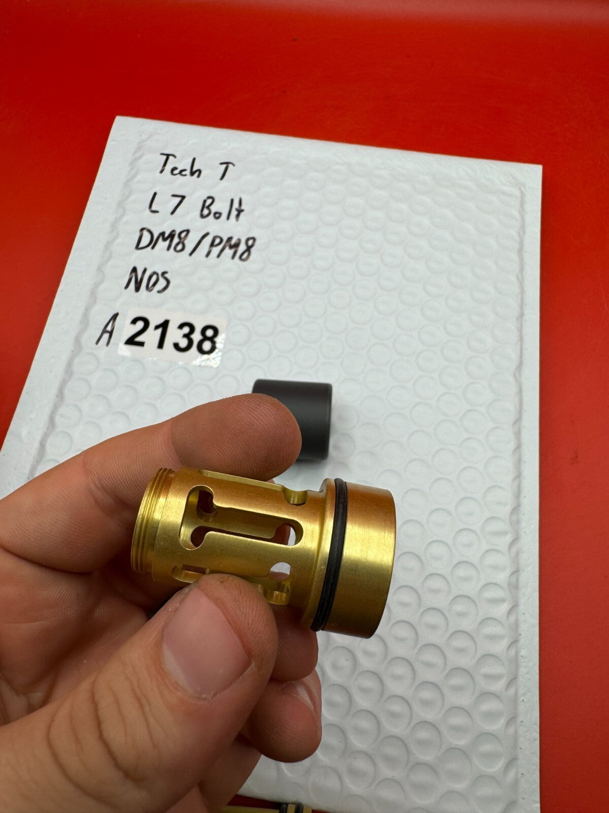 Tech T L7 Bolt DM8/PM8 NOS - used paintball bolt - gold/black