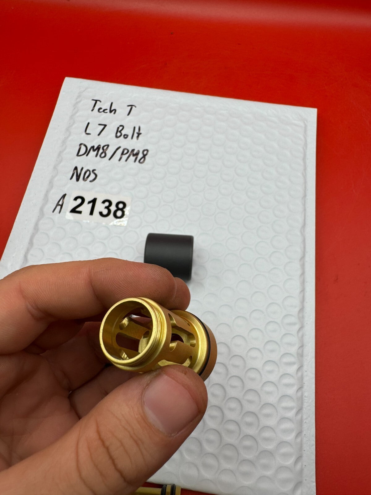 Tech T L7 Bolt DM8/PM8 NOS - used paintball bolt - gold/black