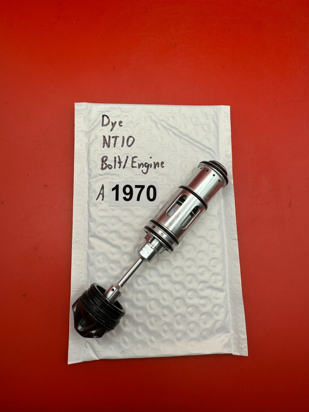 Dye NT10 Bolt/Engine - used paintball bolt/engine assembly - black/silver