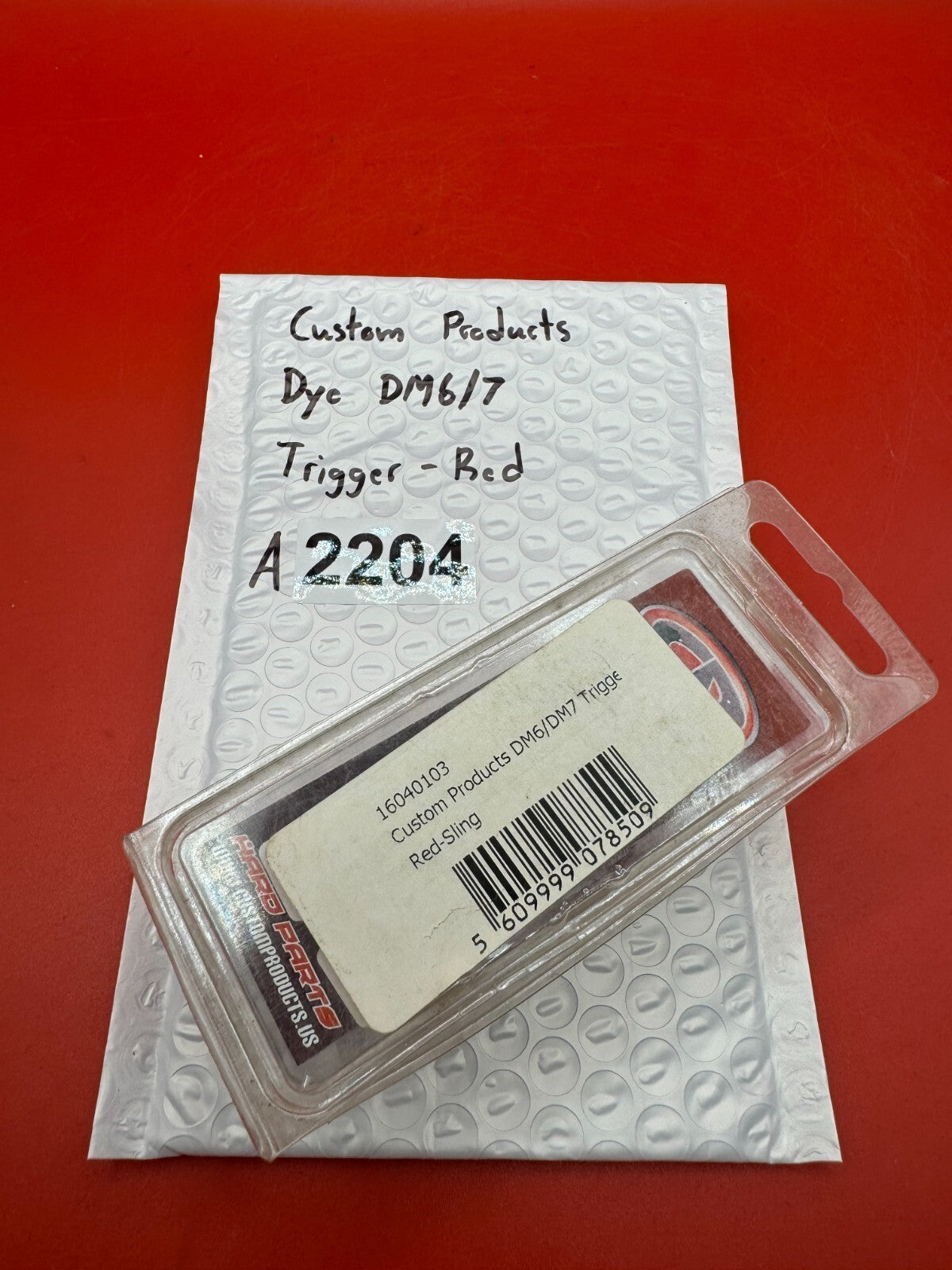 Custom Products Dye DM6/7 Trigger-Red - used paintball trigger - red anno