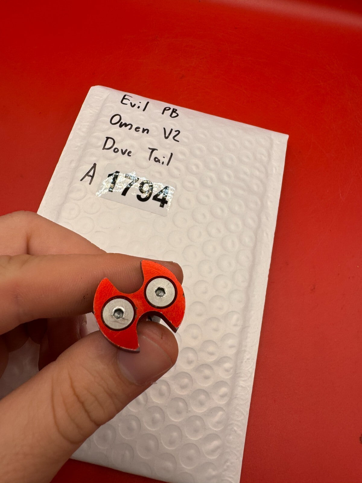 Evil PB Omen V2 Dove Tail - used paintball bolt dovetail / bolt tail assembly - red anno / silver