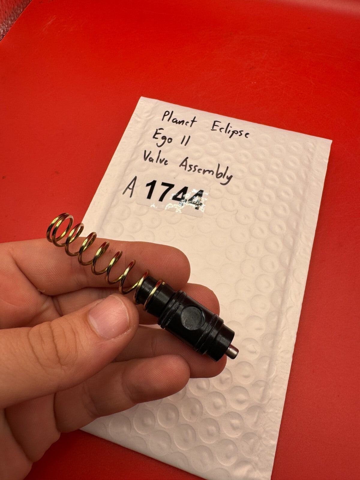 Planet Eclipse Ego II Valve Assembly - used paintball valve assembly - black