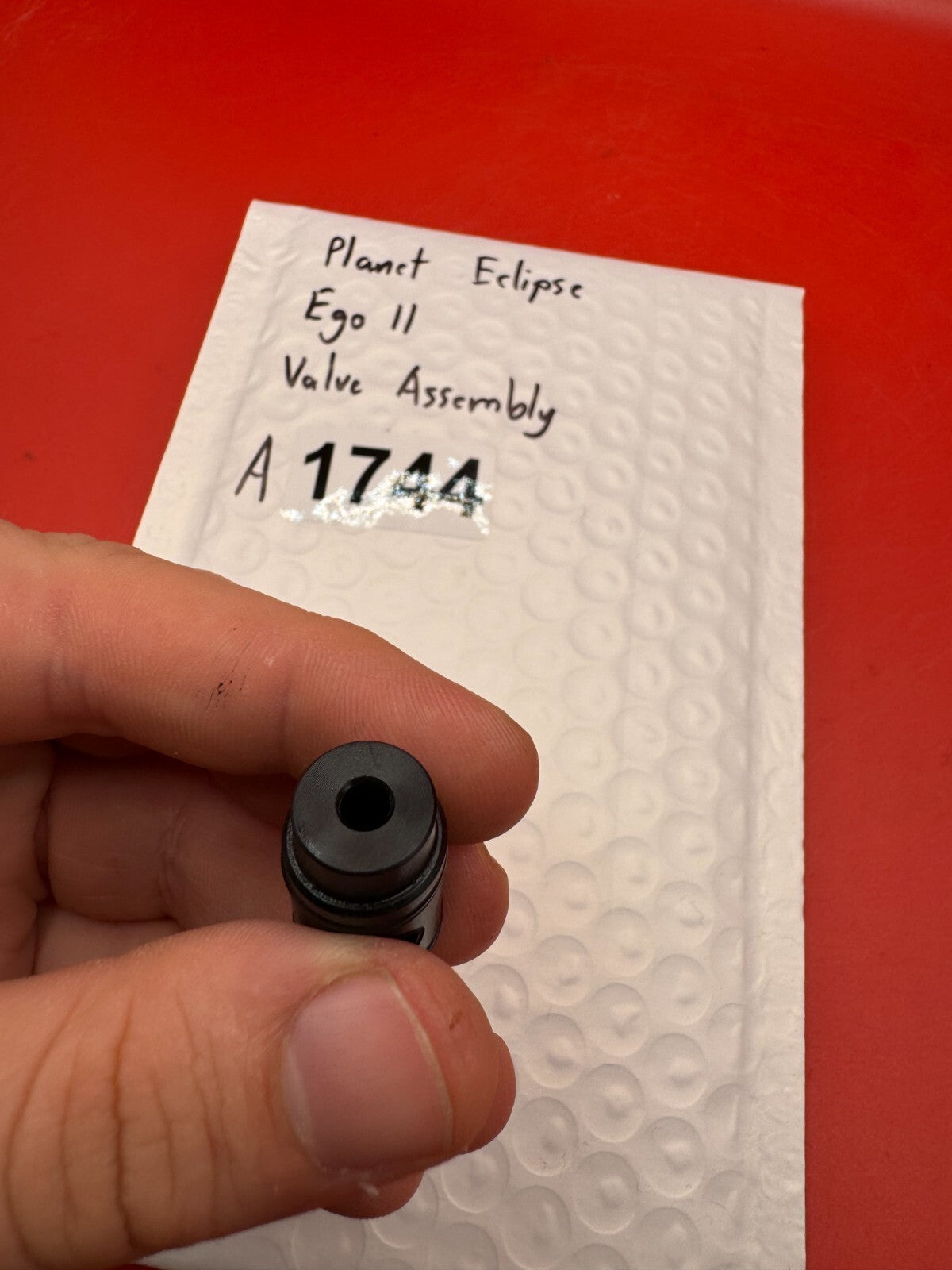 Planet Eclipse Ego II Valve Assembly - used paintball valve assembly - black