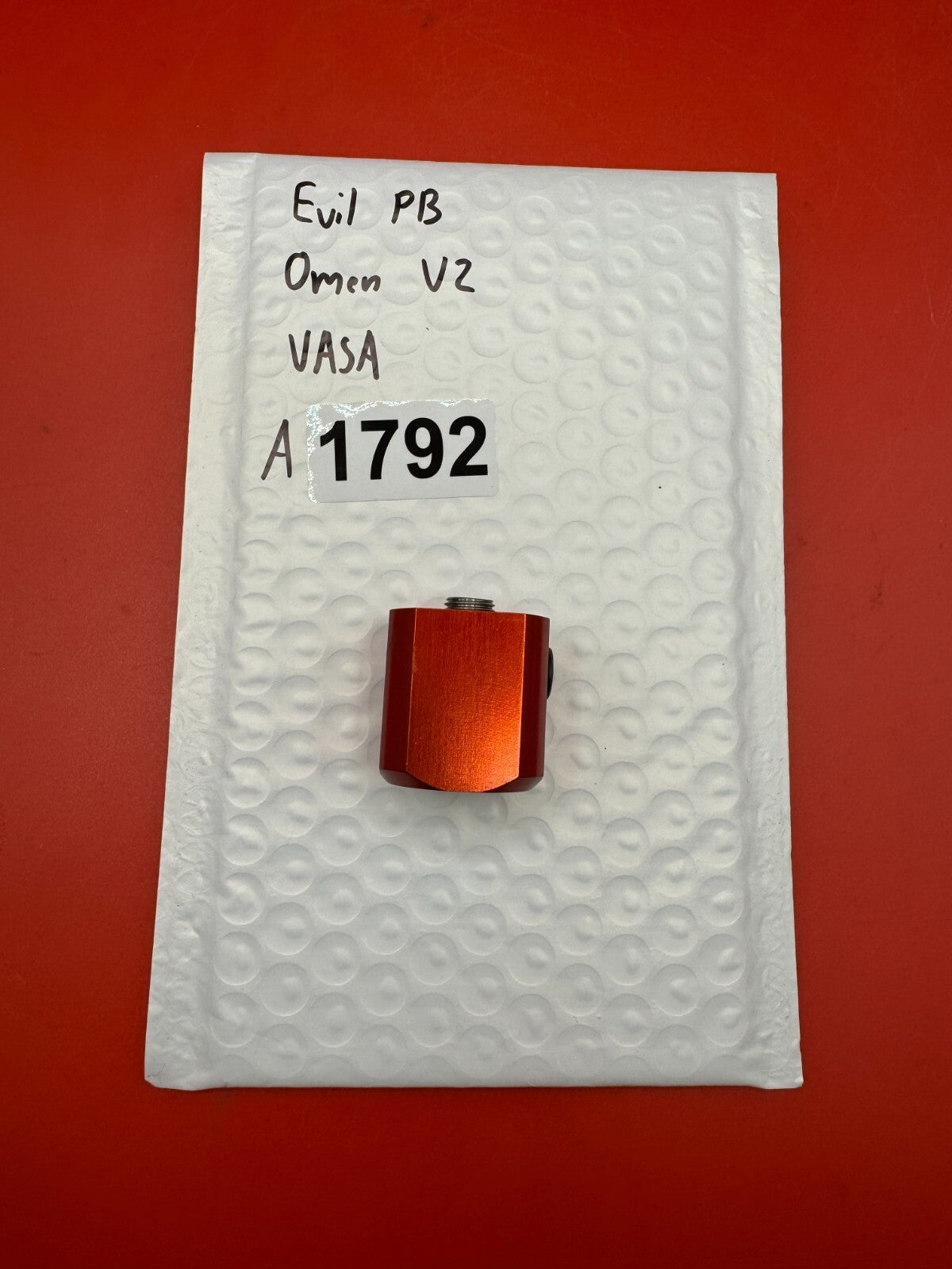 Evil PB Omen V2 VASA - used paintball velocity adjuster / screw assembly (vasa) - orange anno