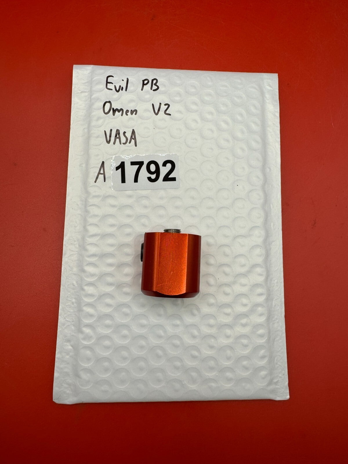 Evil PB Omen V2 VASA - used paintball velocity adjuster / screw assembly (vasa) - orange anno
