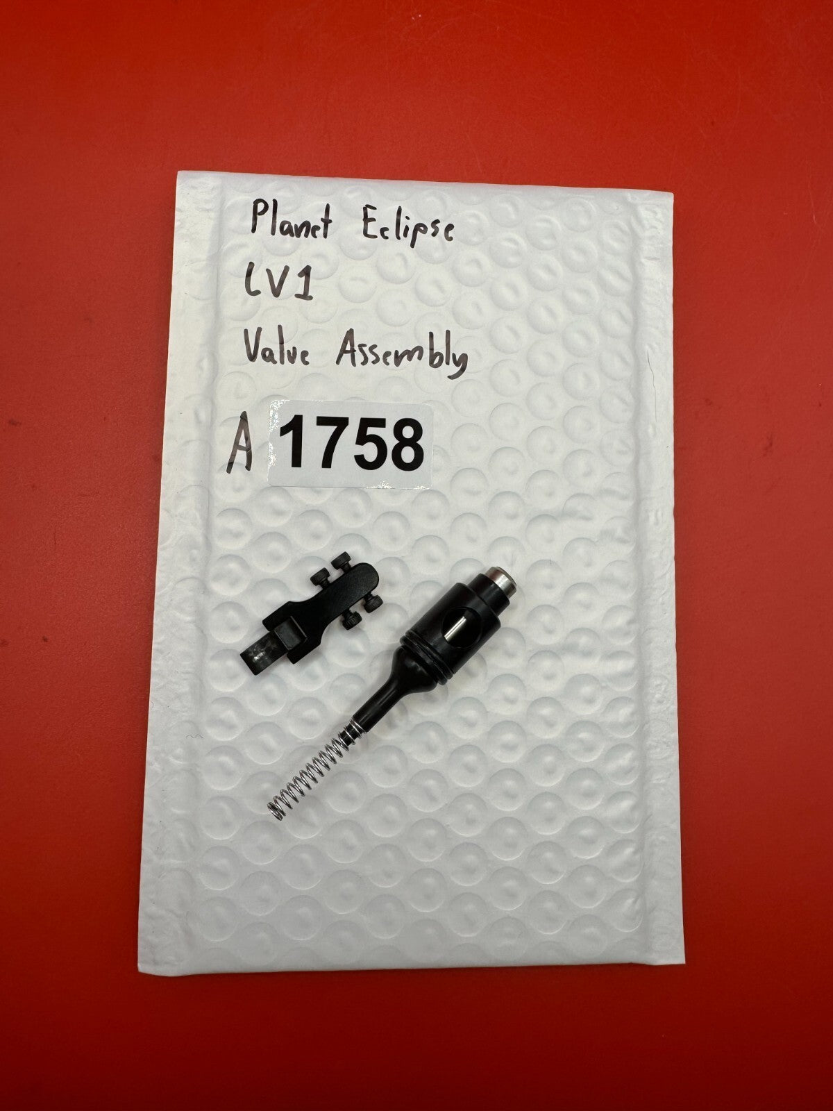 Planet Eclipse LV1 Valve Assembly - used paintball valve assembly - black/silver