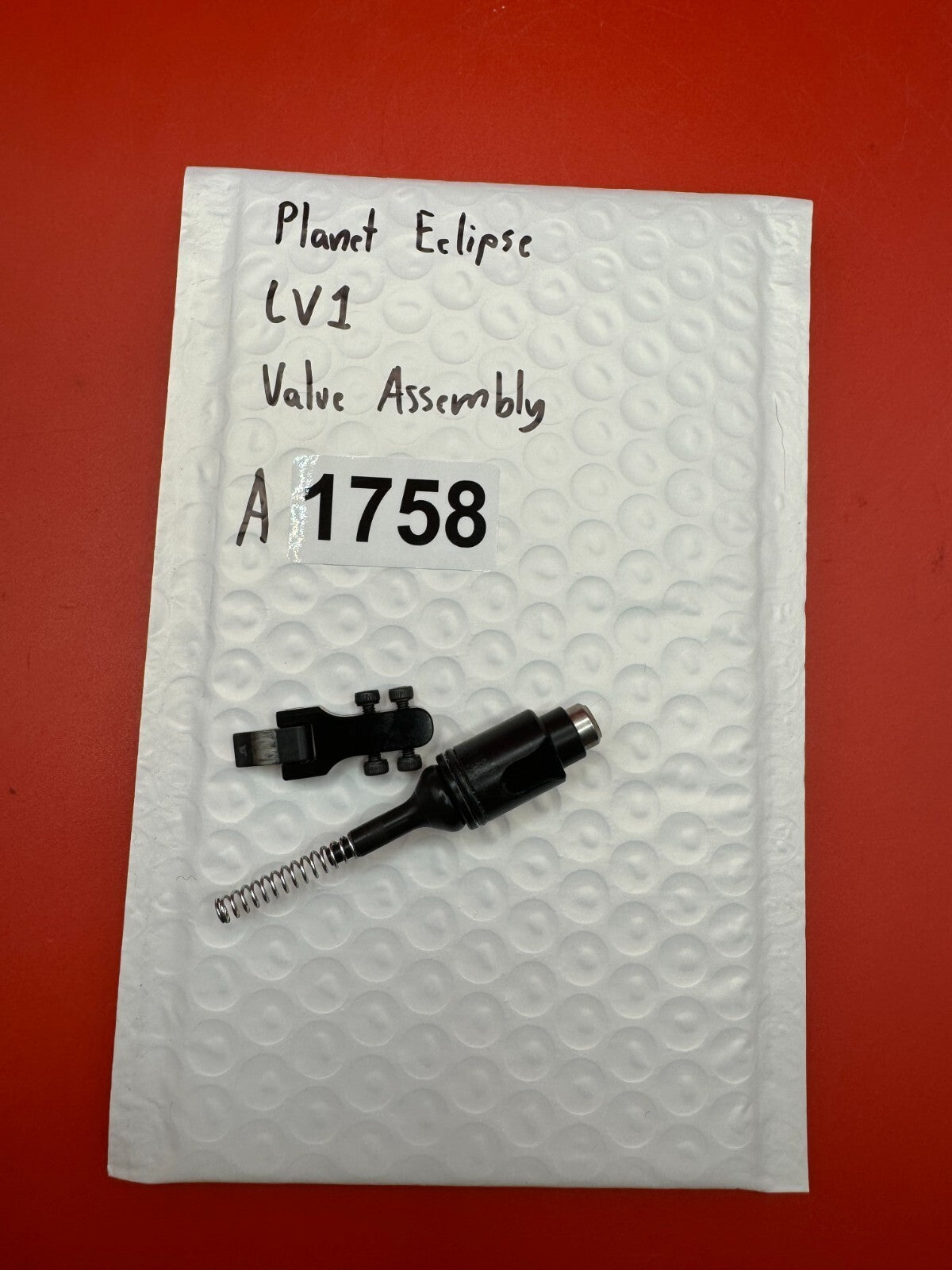 Planet Eclipse LV1 Valve Assembly - used paintball valve assembly - black/silver