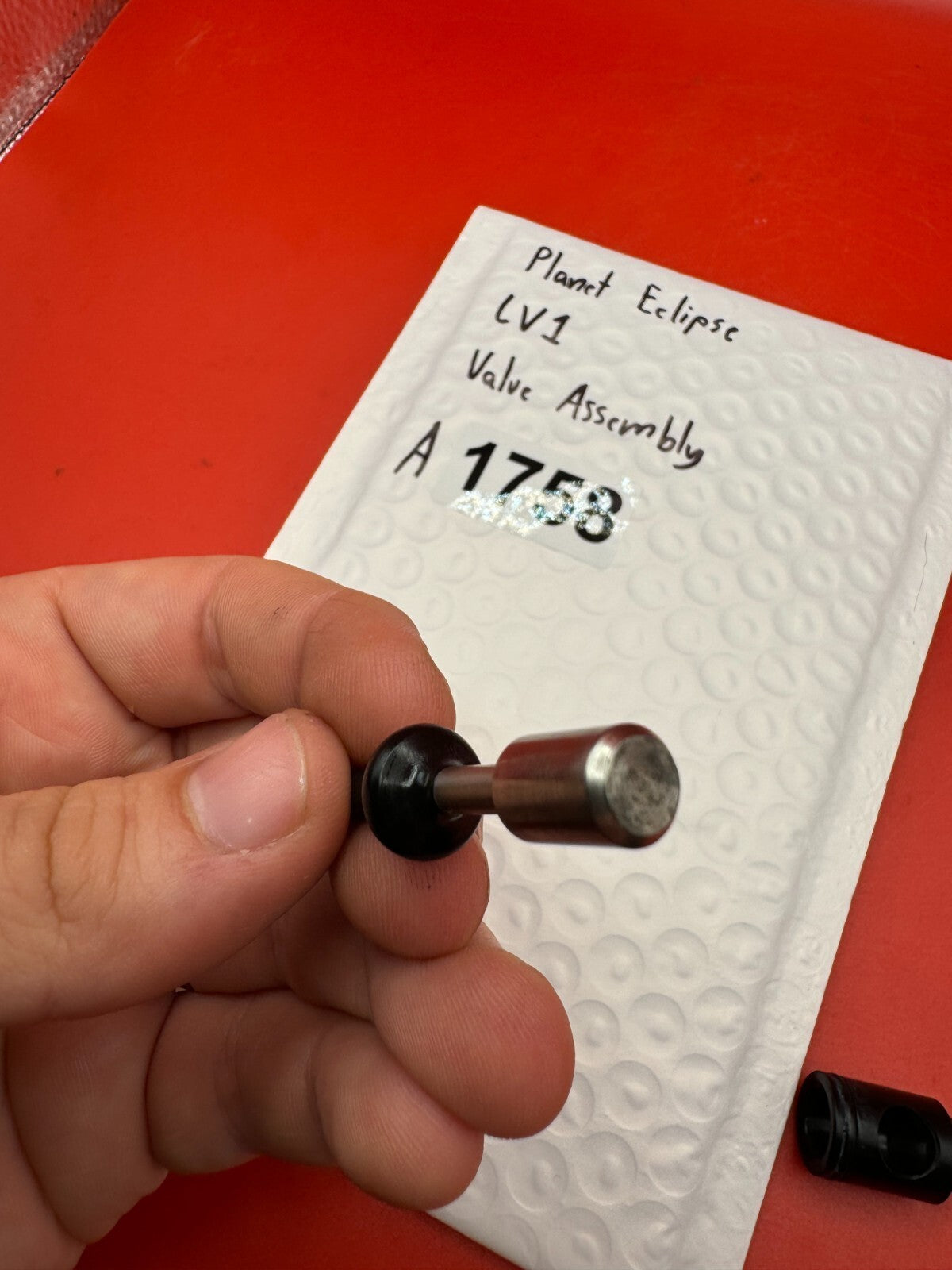 Planet Eclipse LV1 Valve Assembly - used paintball valve assembly - black/silver